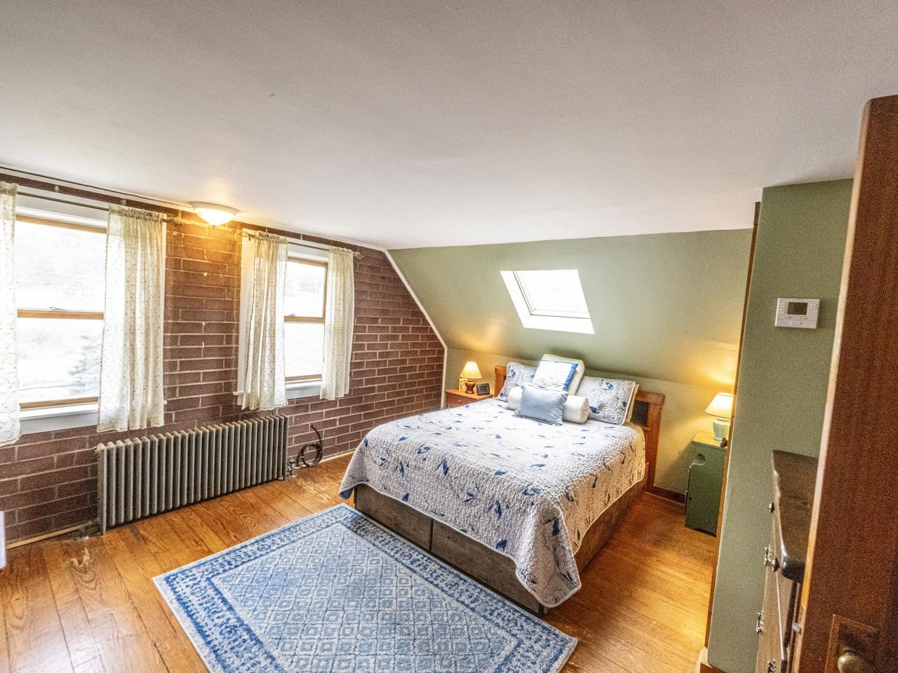 Brick wall and hardwood floor