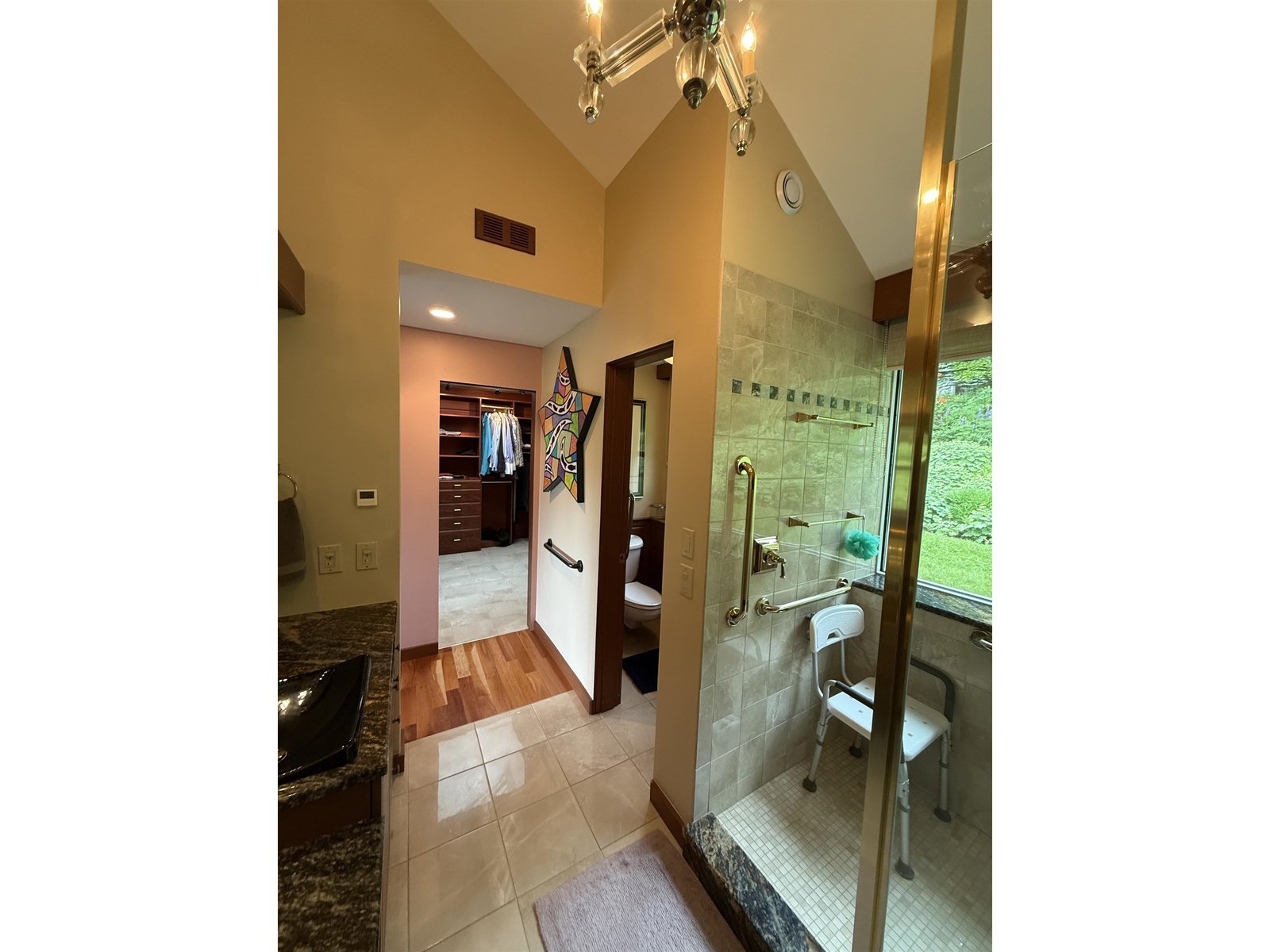 PRIMARY SUITE BATHROOM TO WALK-IN CLOSET
