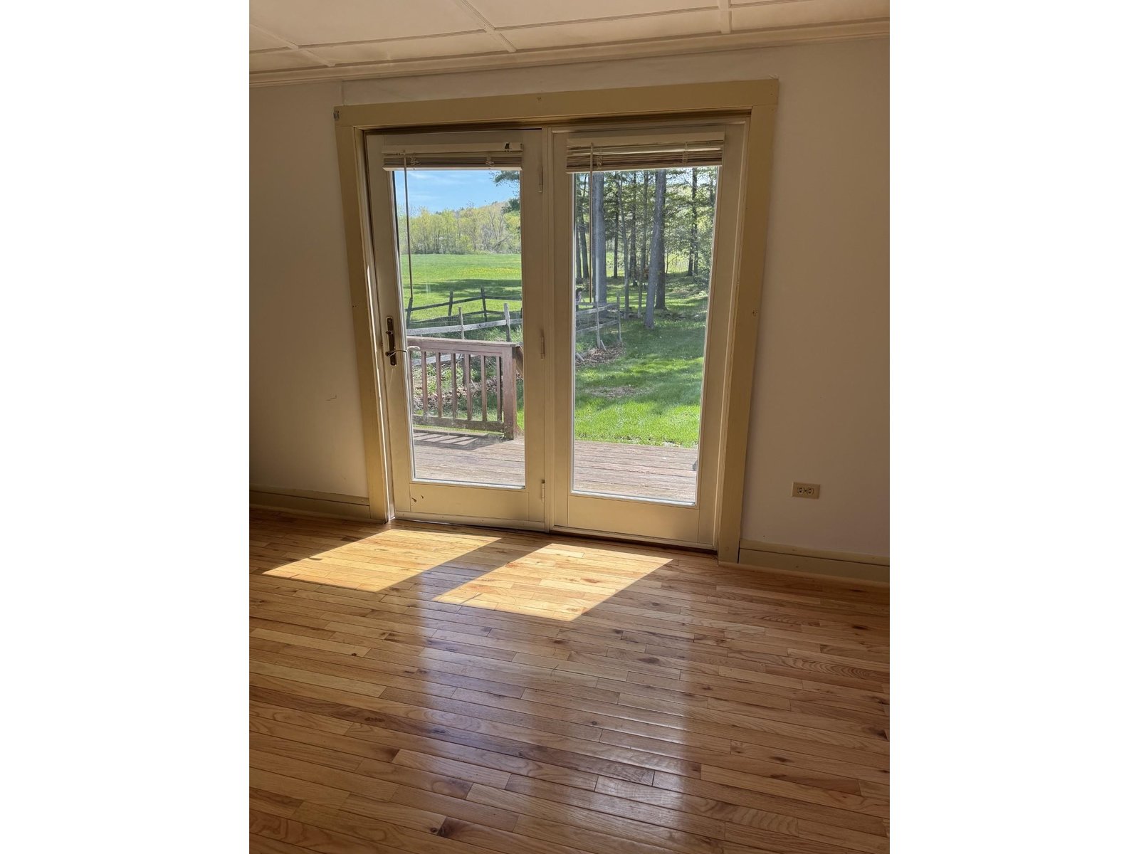 Bedroom 1 with hardwood floors