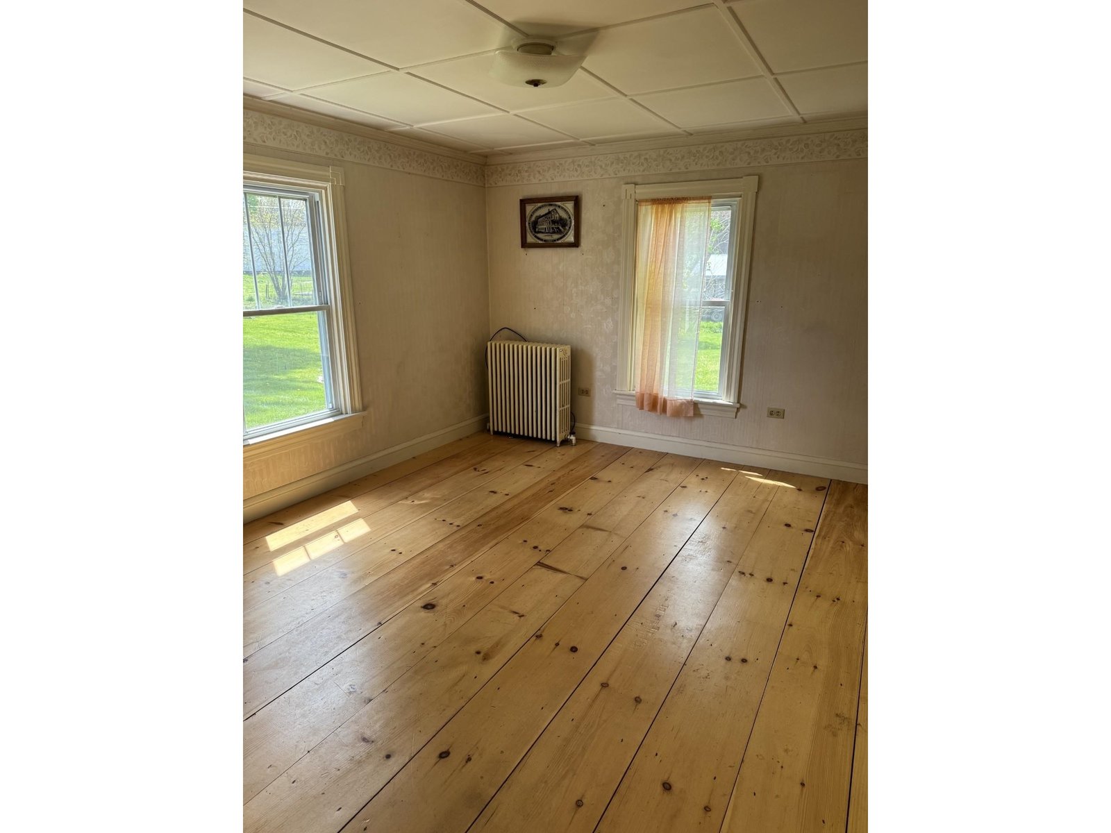 bedroom 2 with pine floors