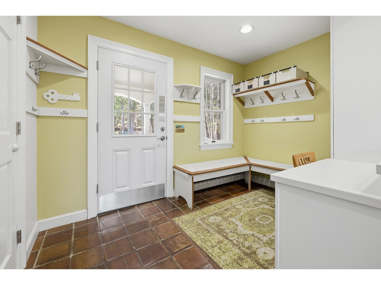 Mudroom Entry with half bath off it