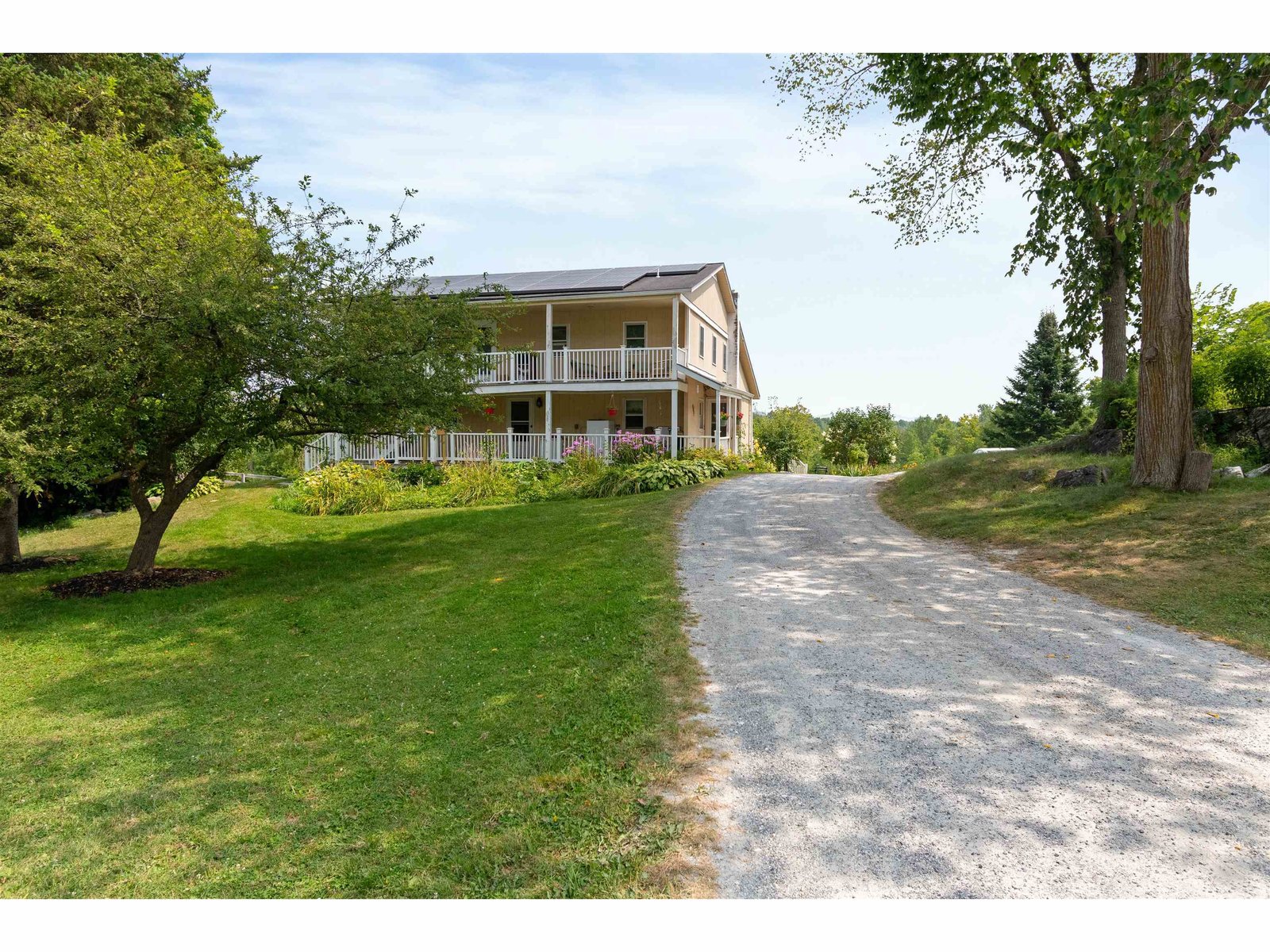 view of the house from the barns