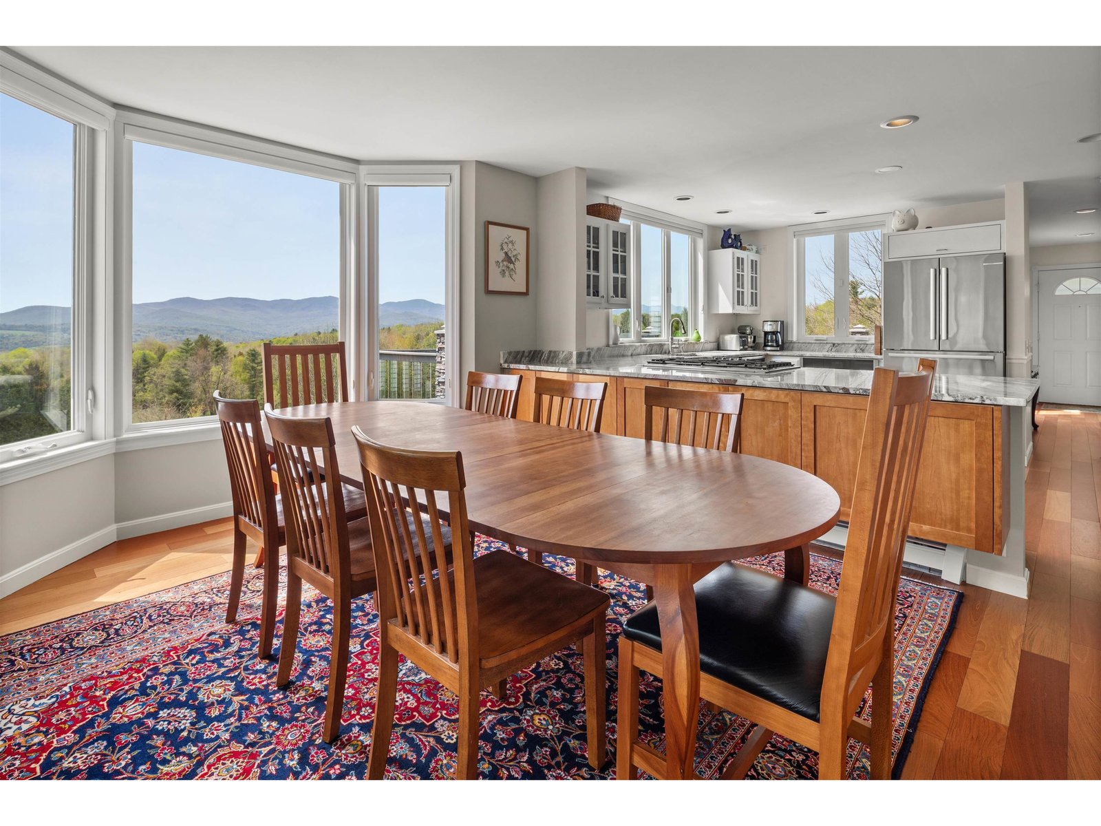 Kitchen flows to dining for ease of entertaining