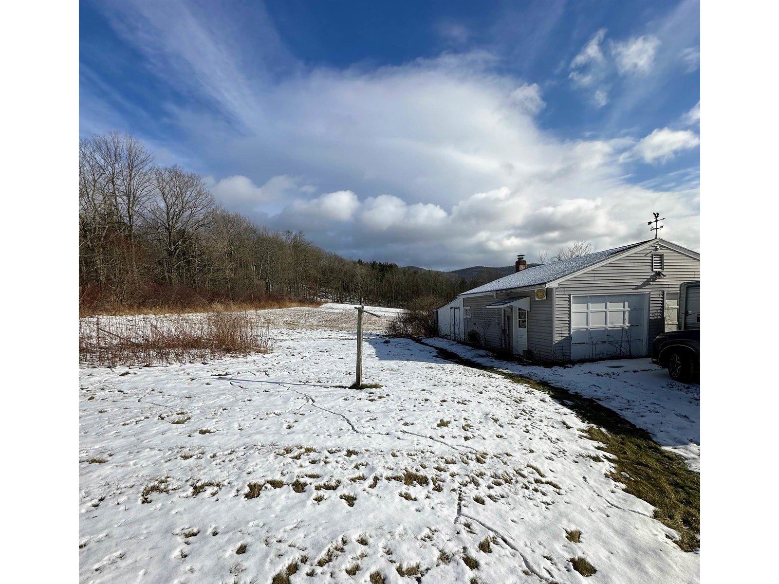 Detached 2 car Garage with workshop/storage wing in back