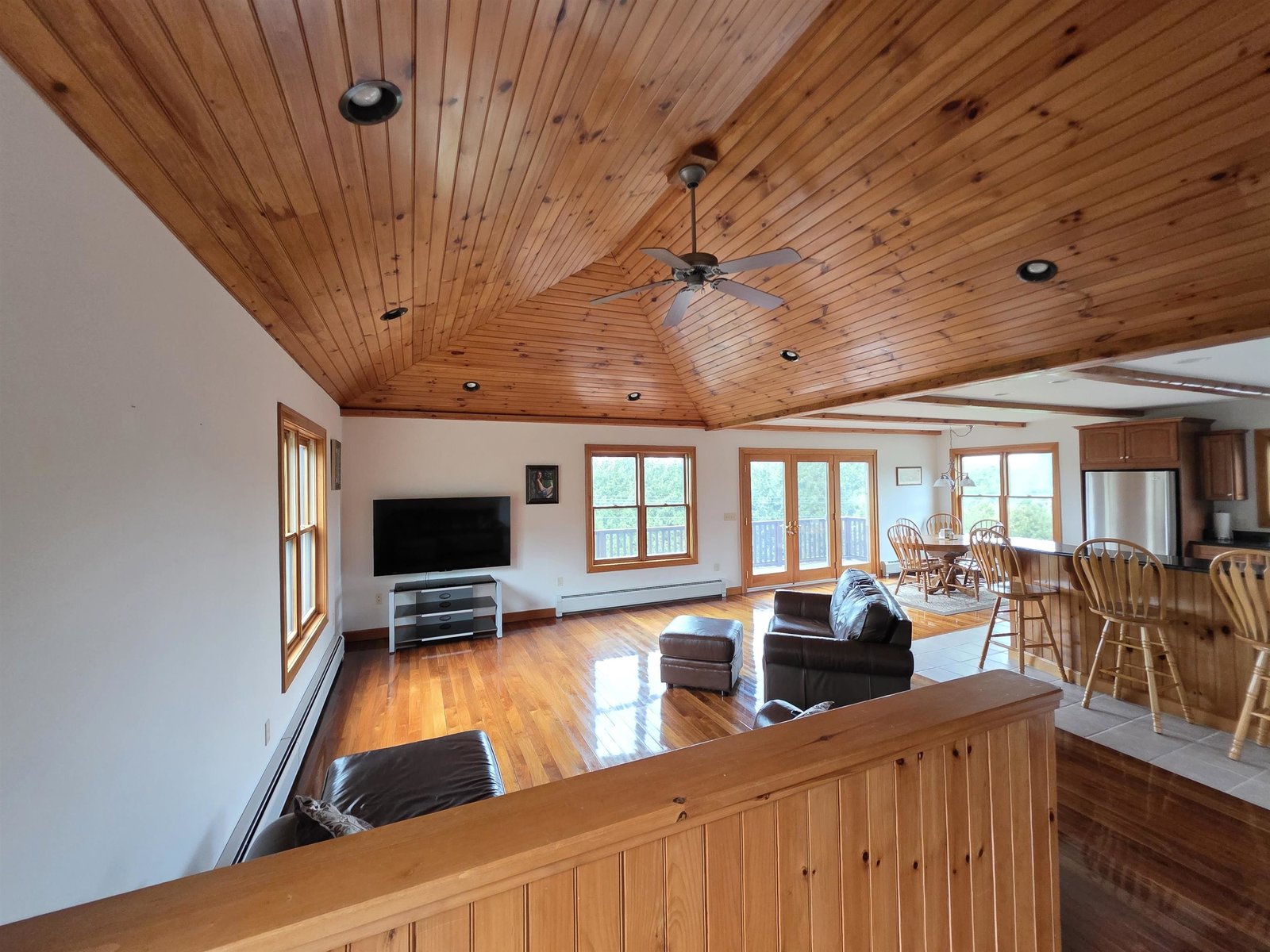 Open floor plan to living, dining room and kitchen