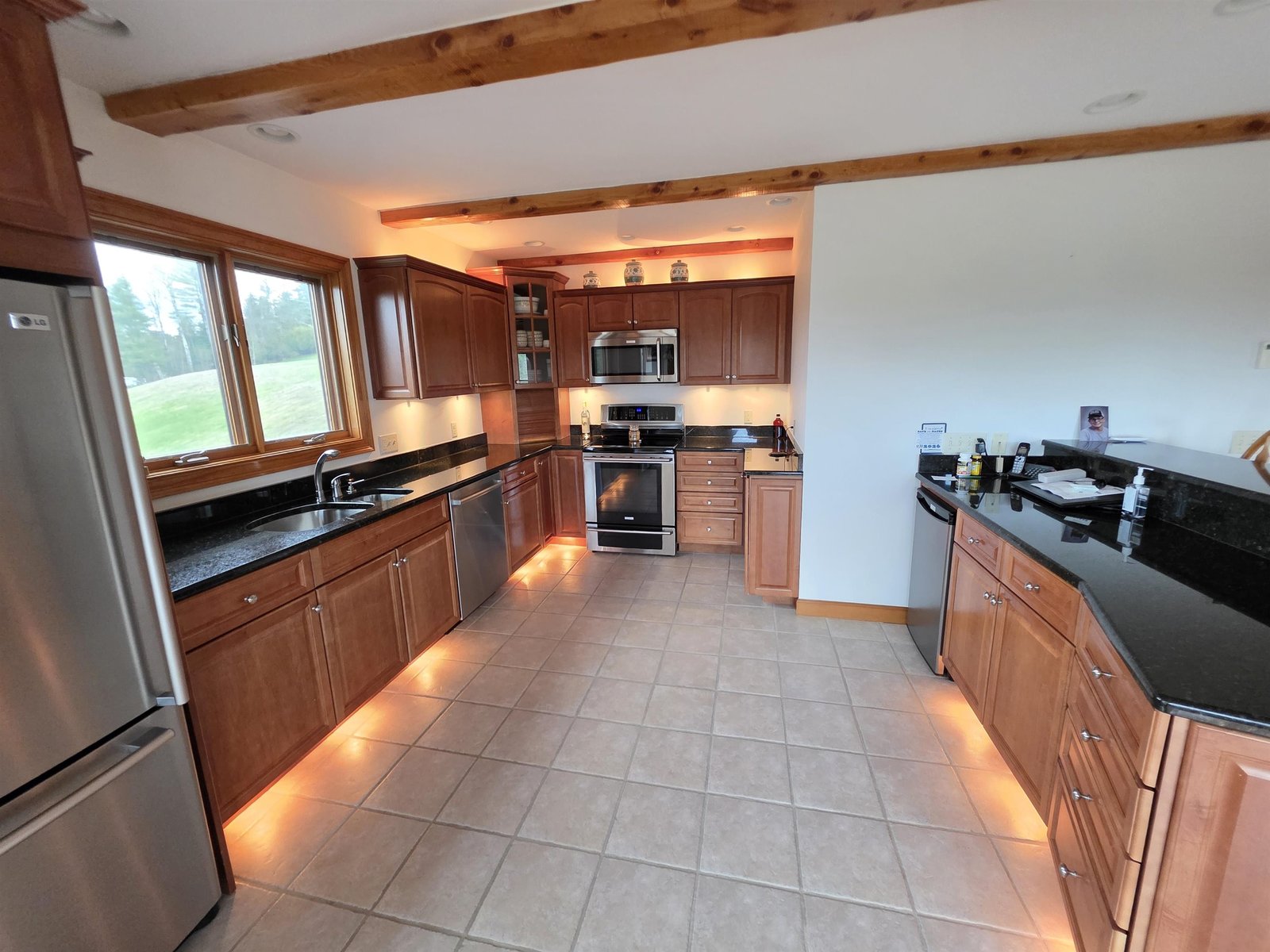 Beautiful granite countertops and switched cabinet lighting