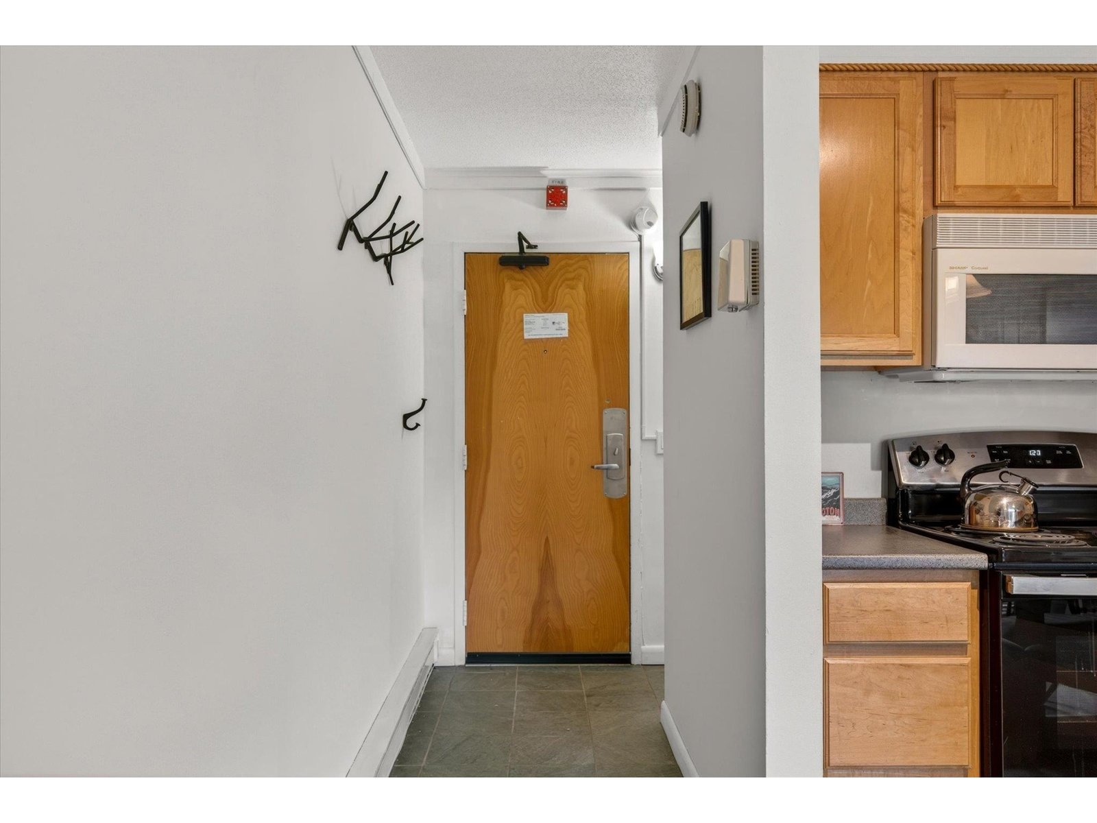 Entry door is located at the end of the hallway