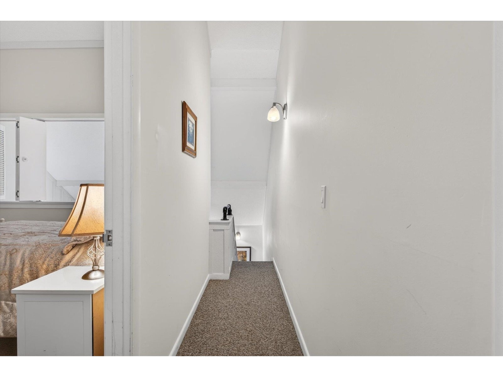 Upstairs hallway to 2 bedrooms and bathroom