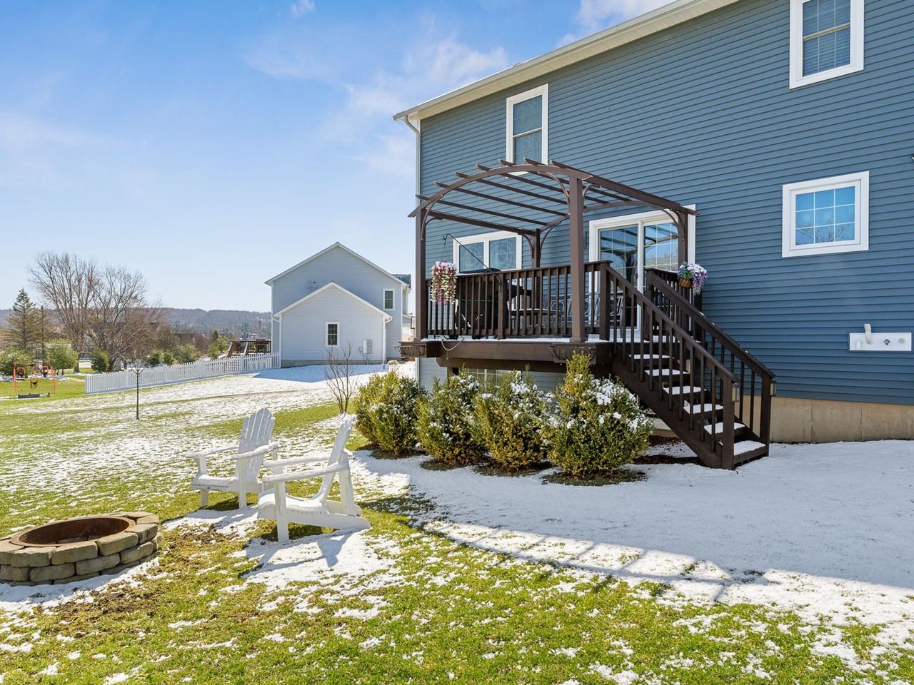 Backyard with deck & fire pit