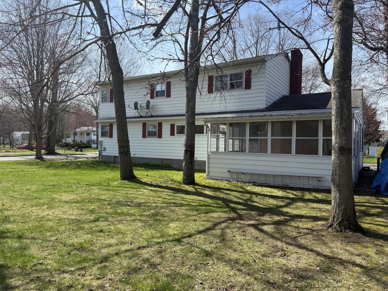 Enclosed Porch in Back