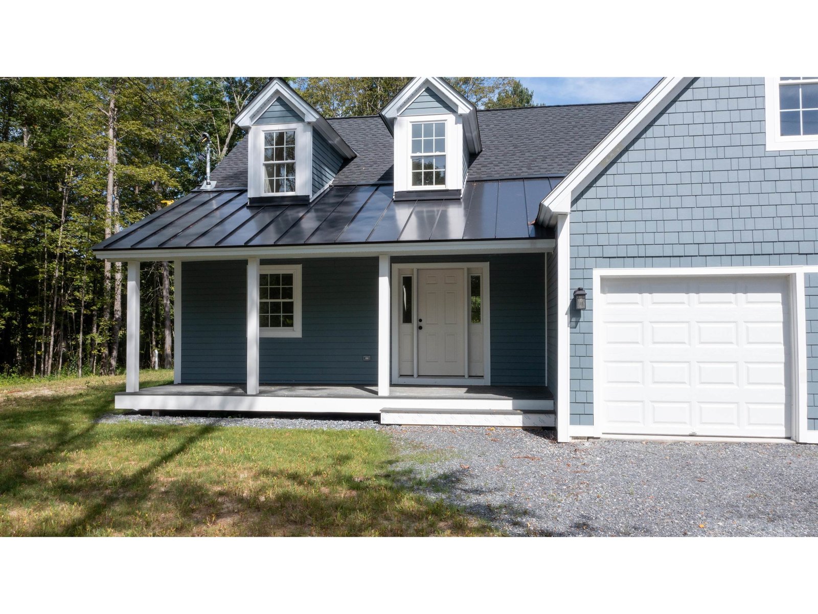 Standing Seam Roof with Architectural Shingle Roof