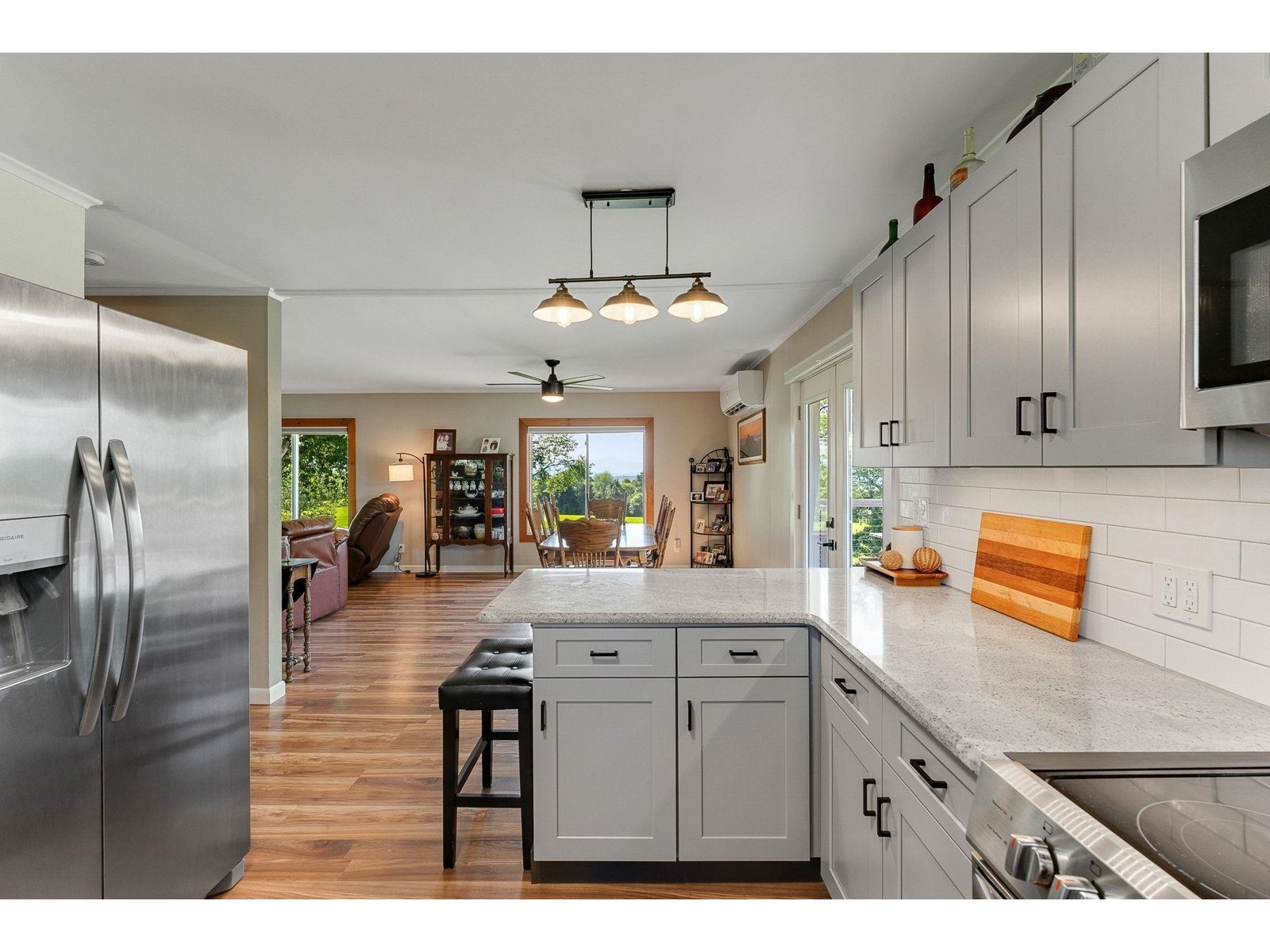 Looking from kitchen peninsula to dining area