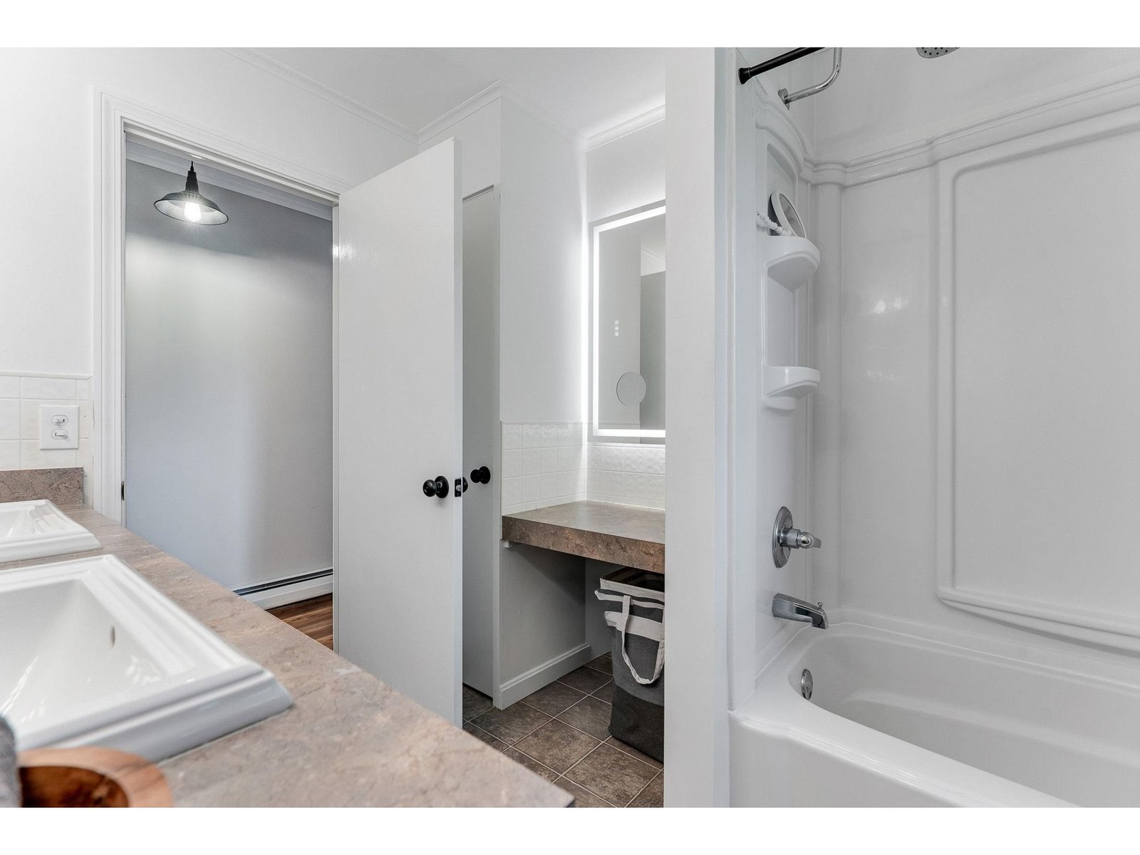 Bathroom includes double vanity and separate 