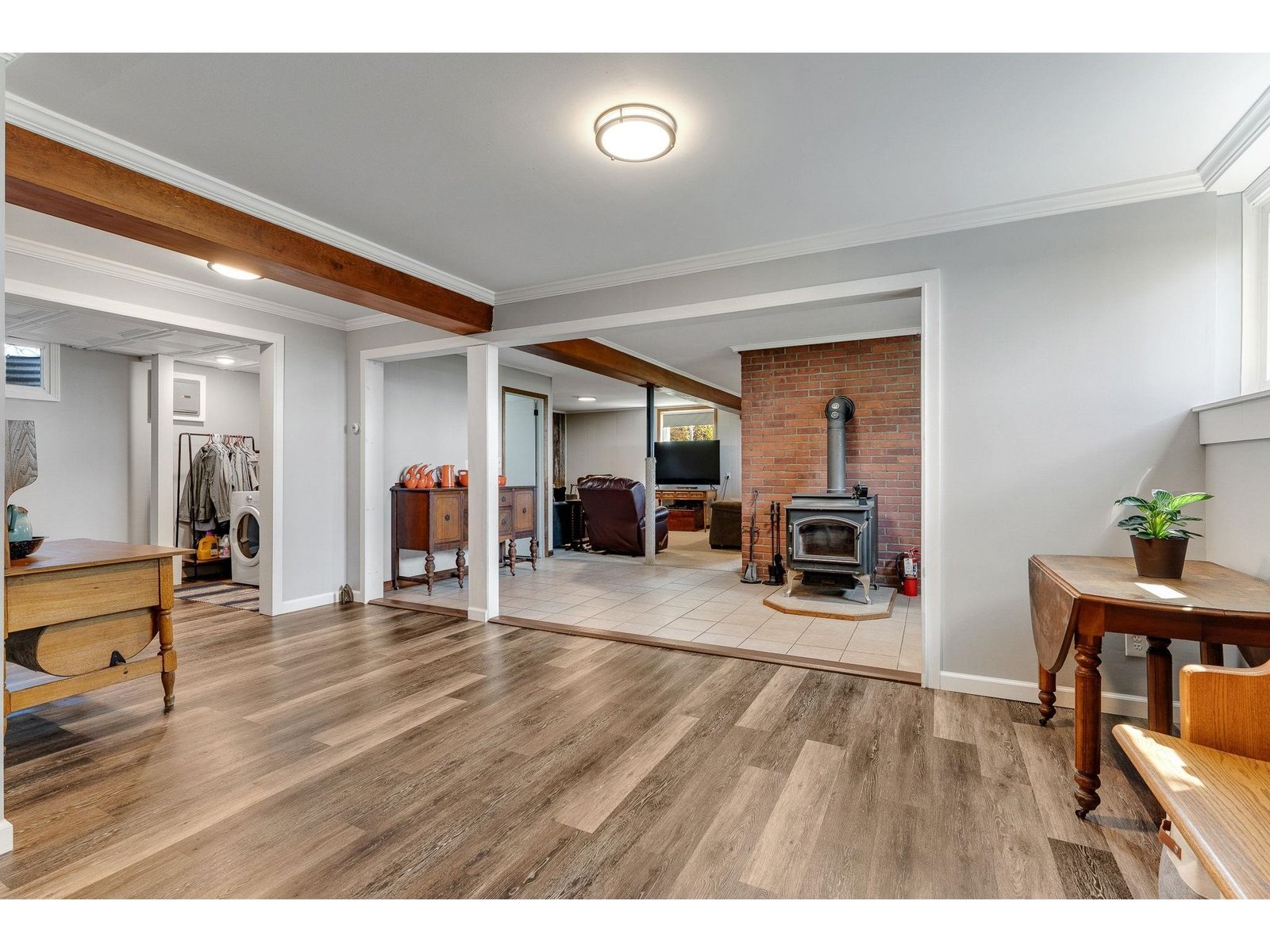 Double sided fireplace serves 2 usable spaces on this level