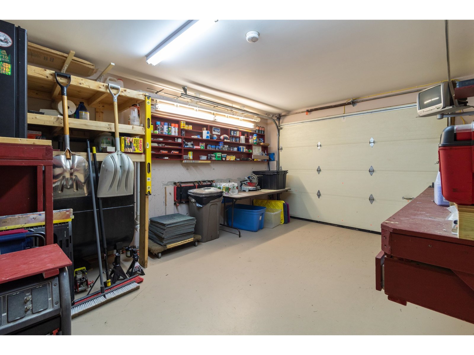 Garage outfitted for a great 'shop space'