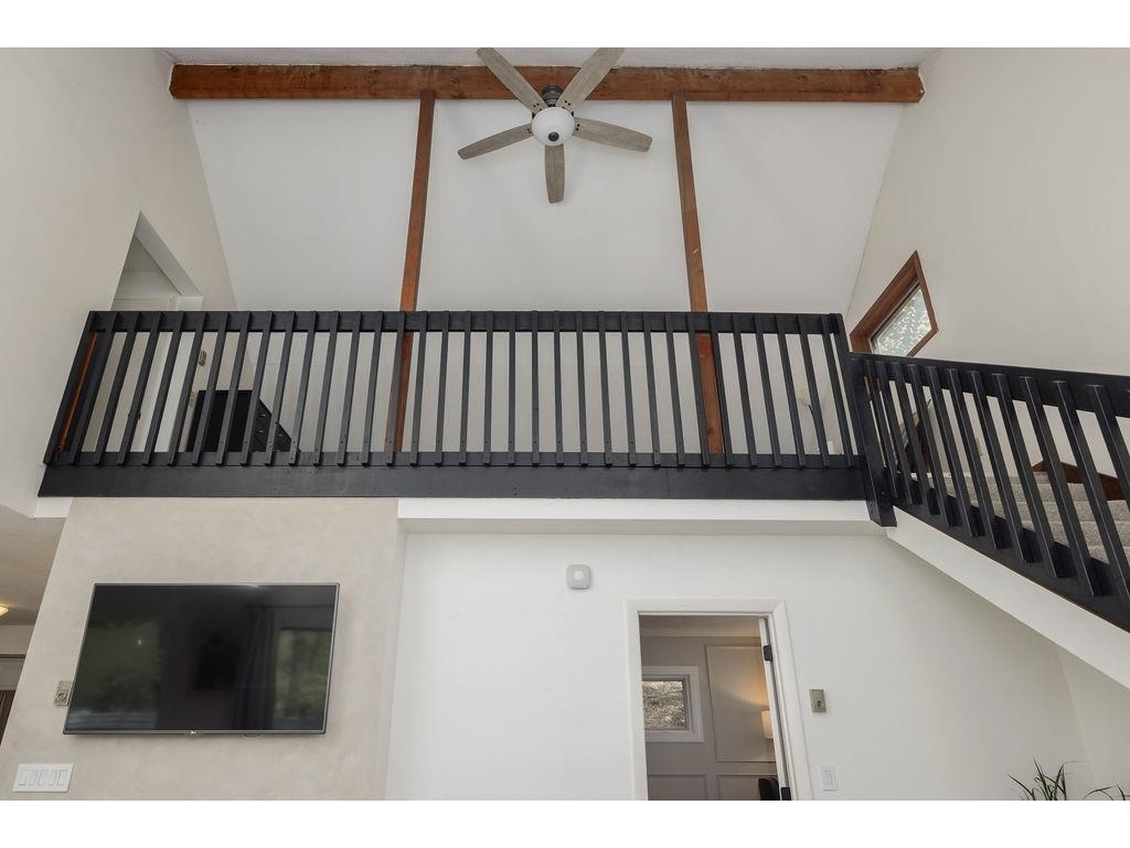Livingroom with sliders to deck