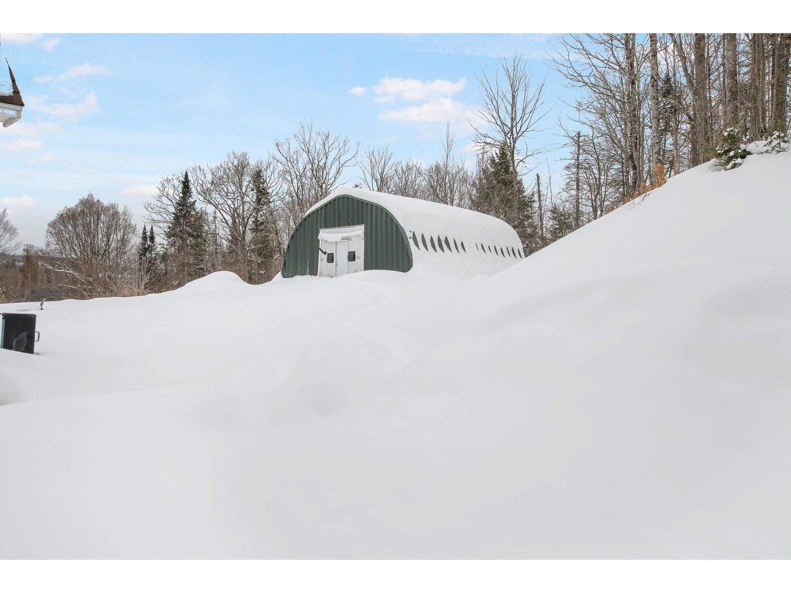 Quonset hut with spray foam and electricity