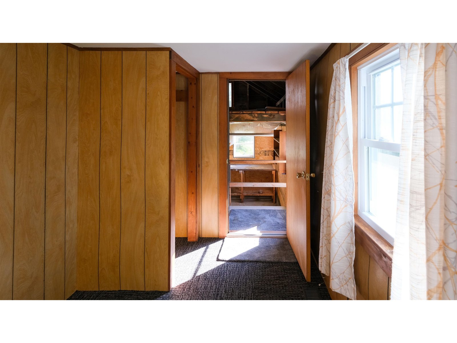 Cottage bonus room toward garage