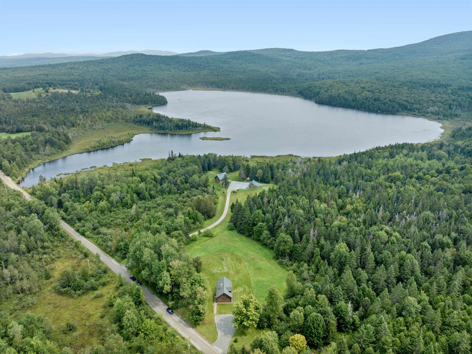 Two homes one abutting Flagg Pond!