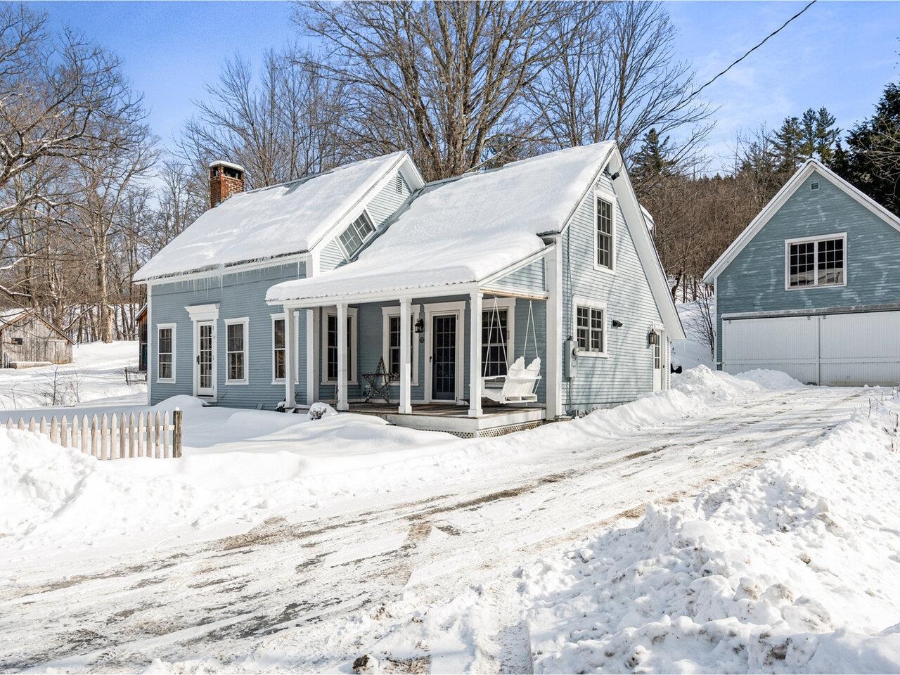 With detached garage on 1+ ac