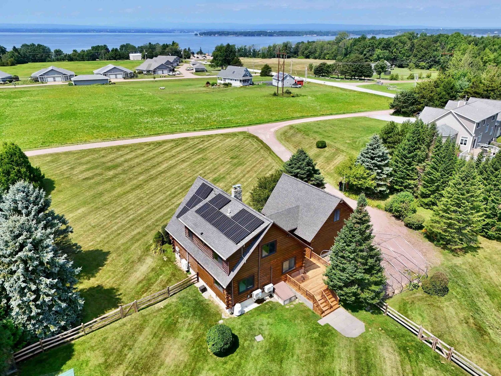 Contemporary log home with outbuildings