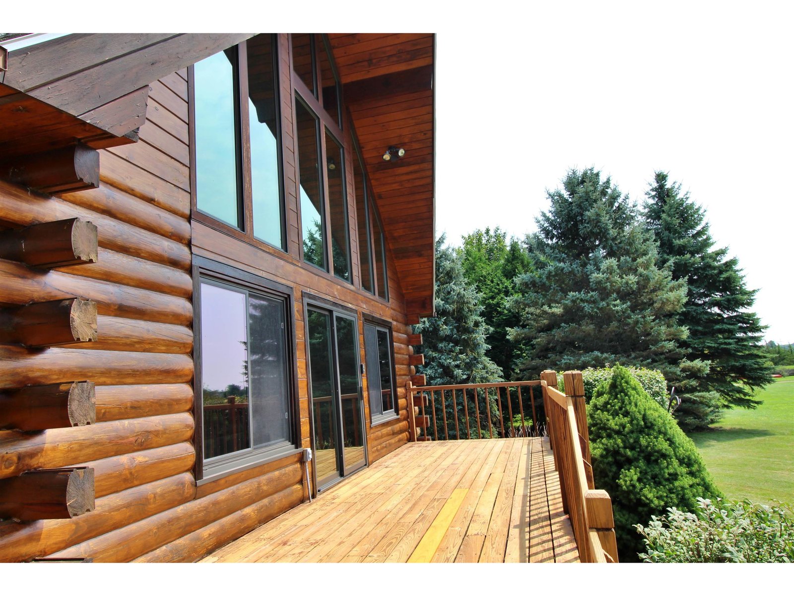 Front deck and a wall of windows