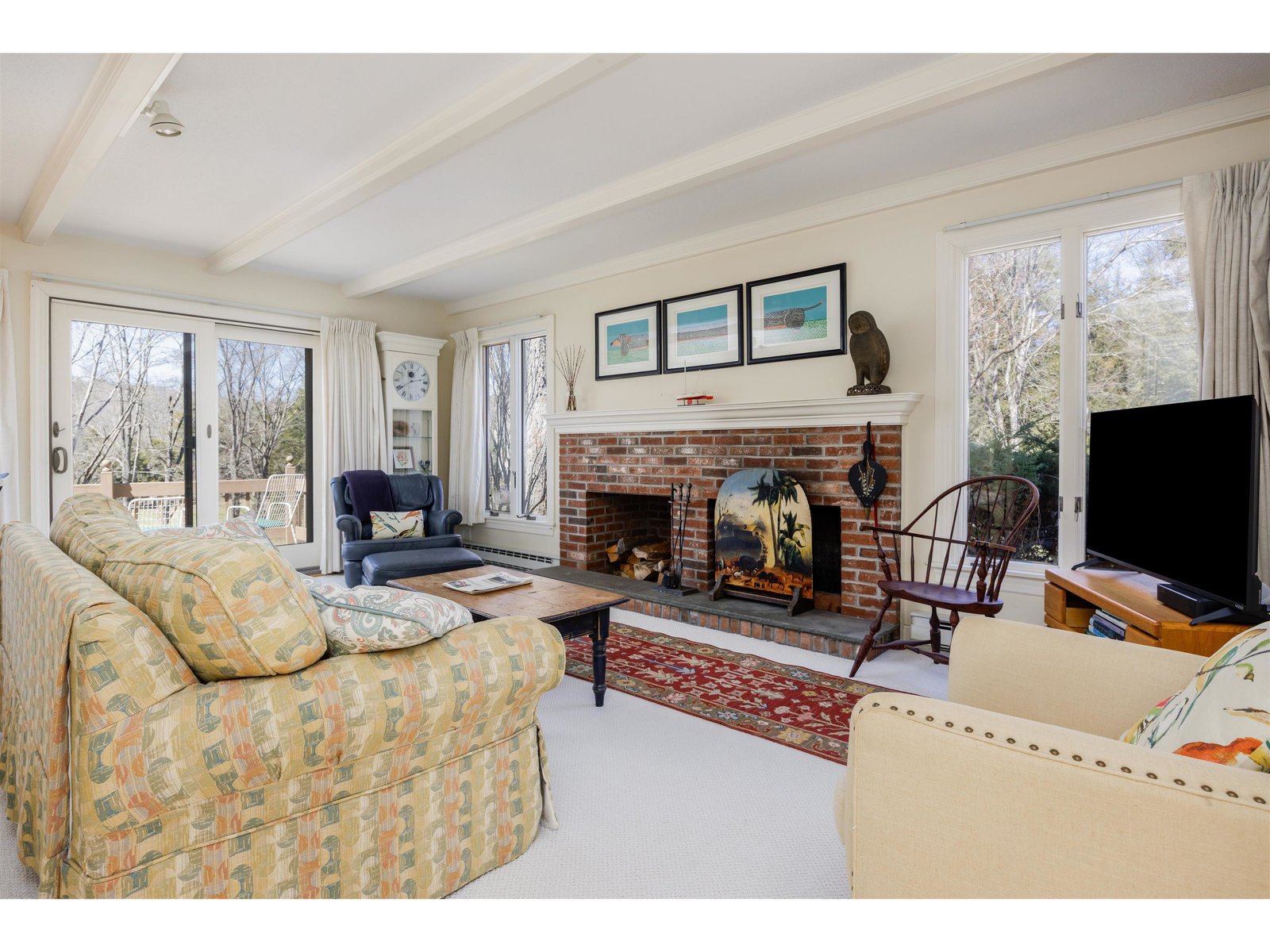 Living Room with Wood Burning Fireplace and Views