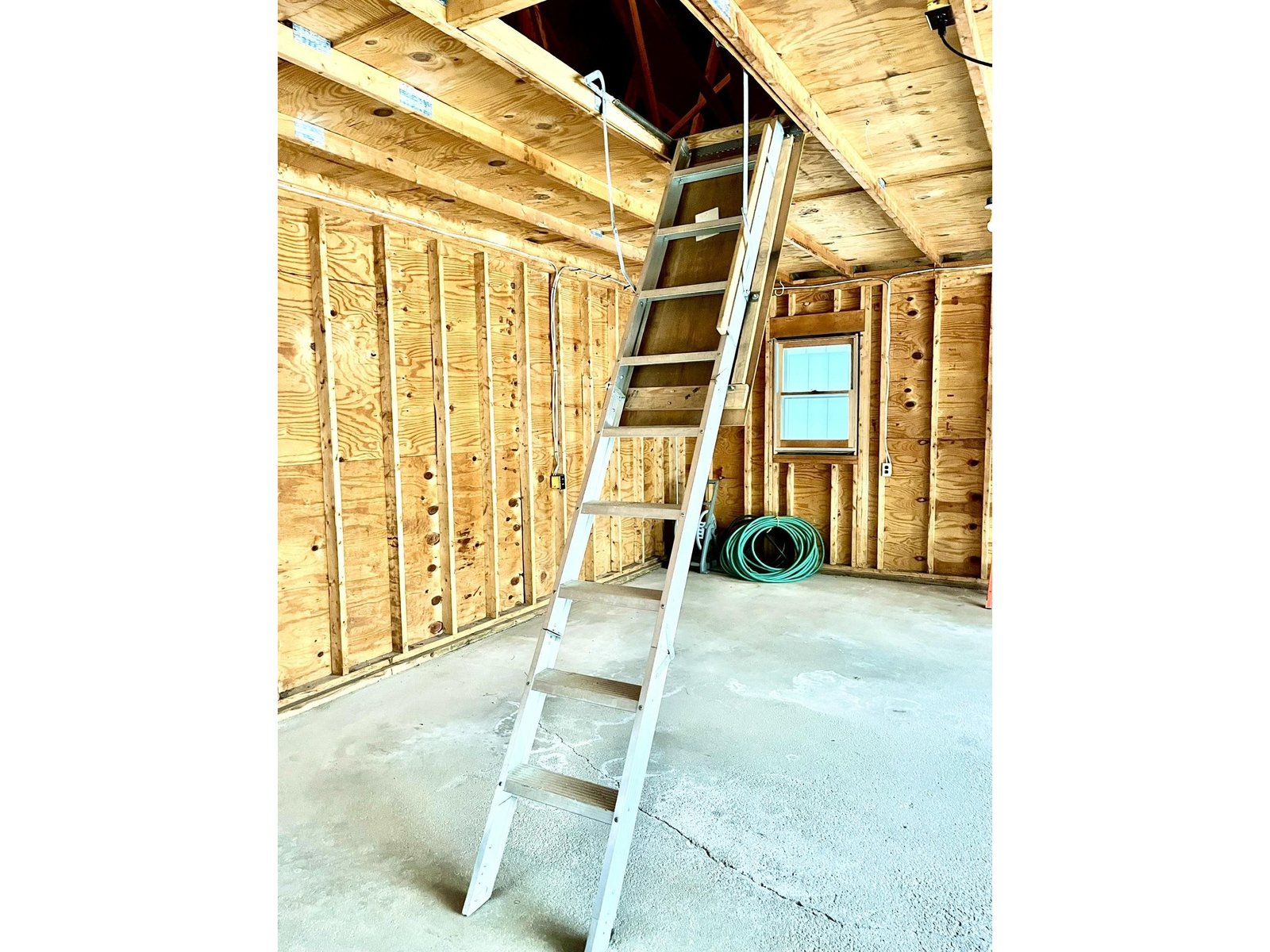 access above garage storage