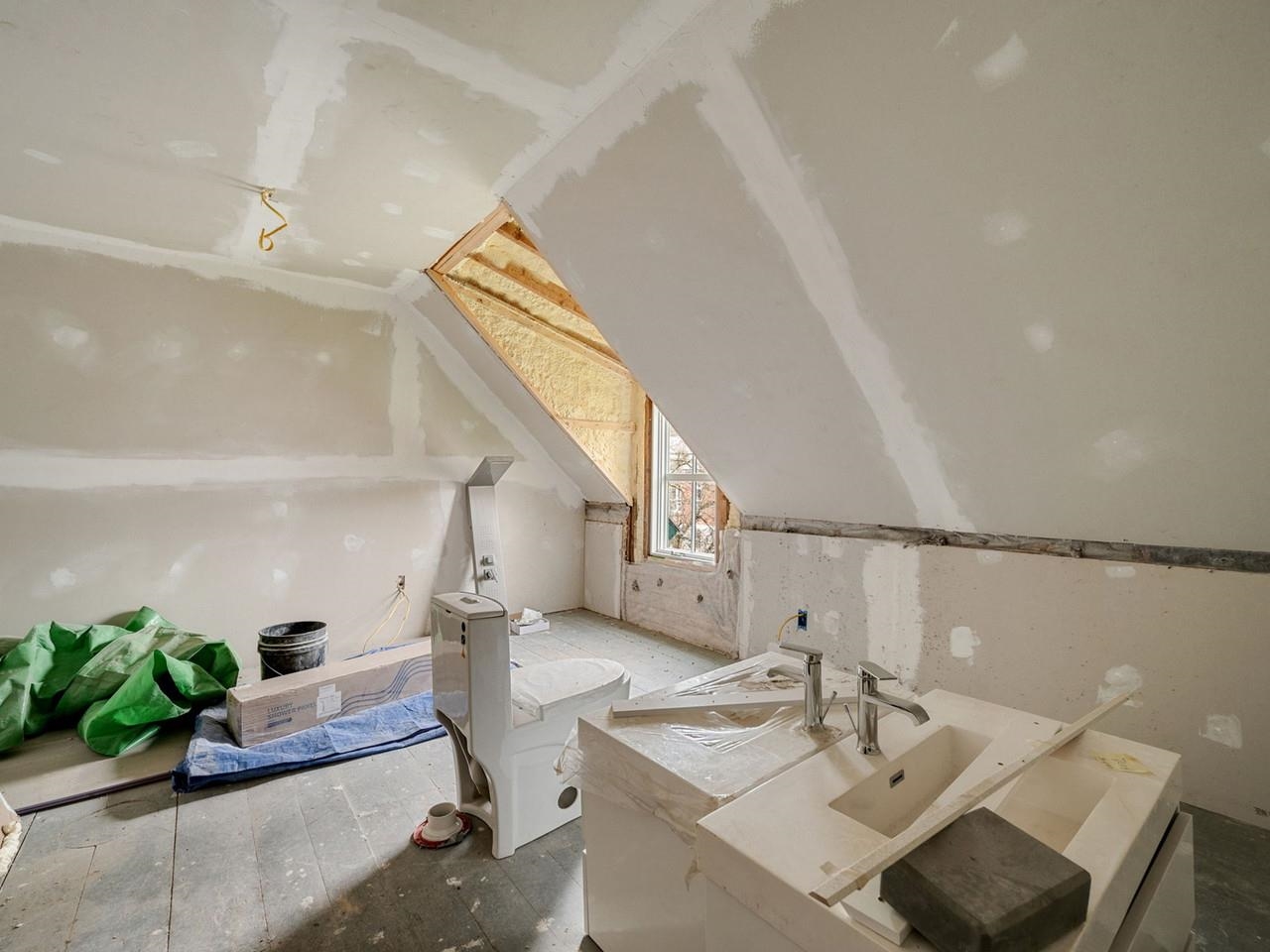Sheetrocked bedroom