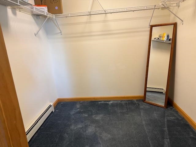 large walk-in closet in Primary Bedroom