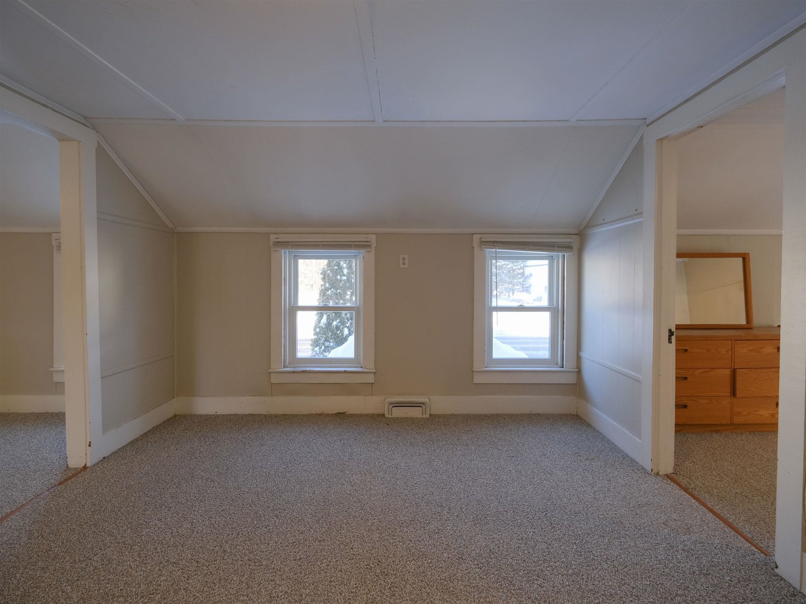 Unit 2 - Living/Dining Rooms - Door to enclosed porch