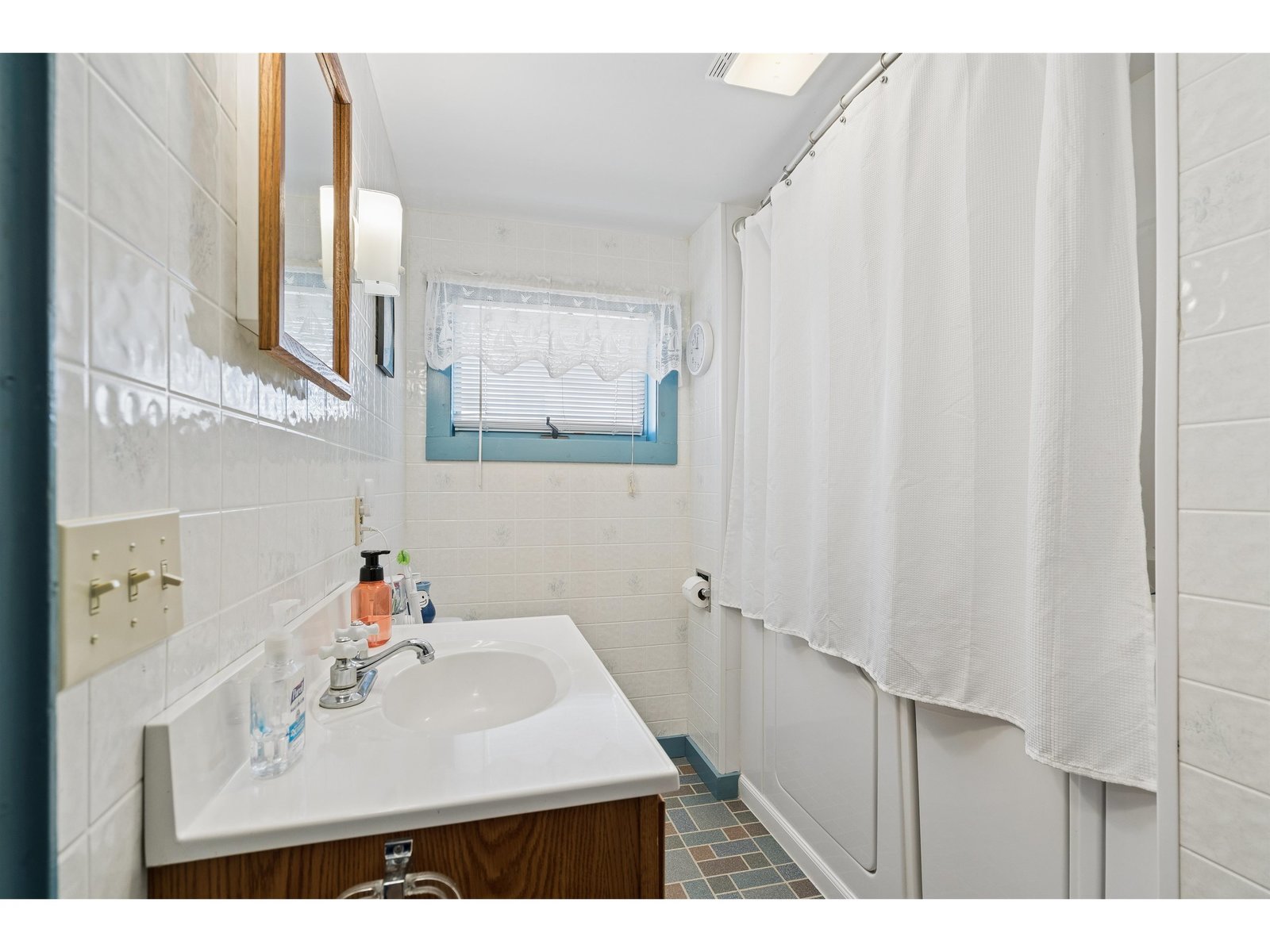 Full bathroom off of bonus room on first floor