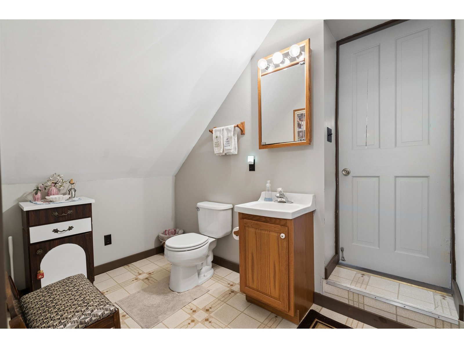 Second floor half bath in between third bedroom and bonus room