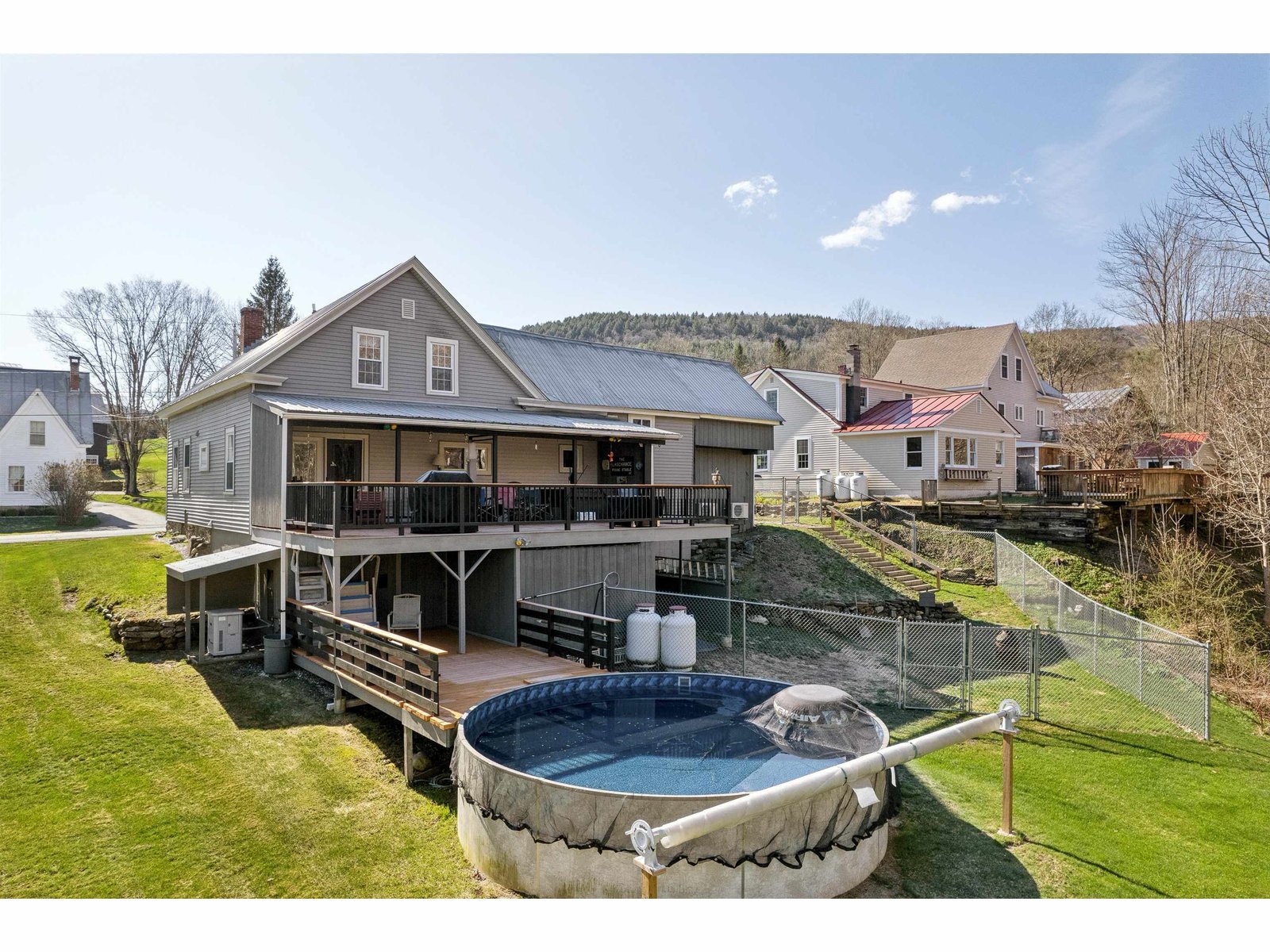 Back of house with pool view
