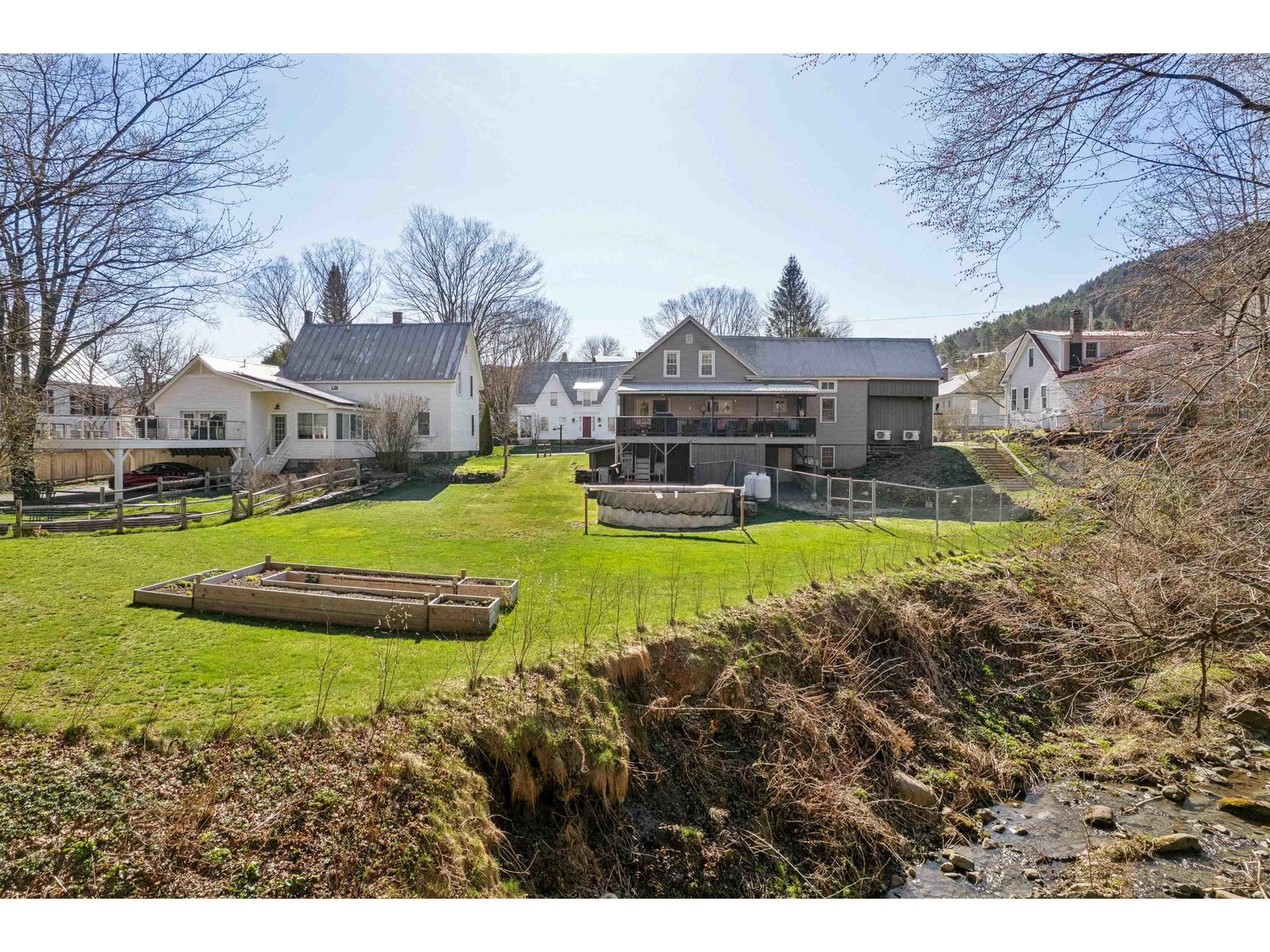 Back yard view of house from the Happy Valley Brook