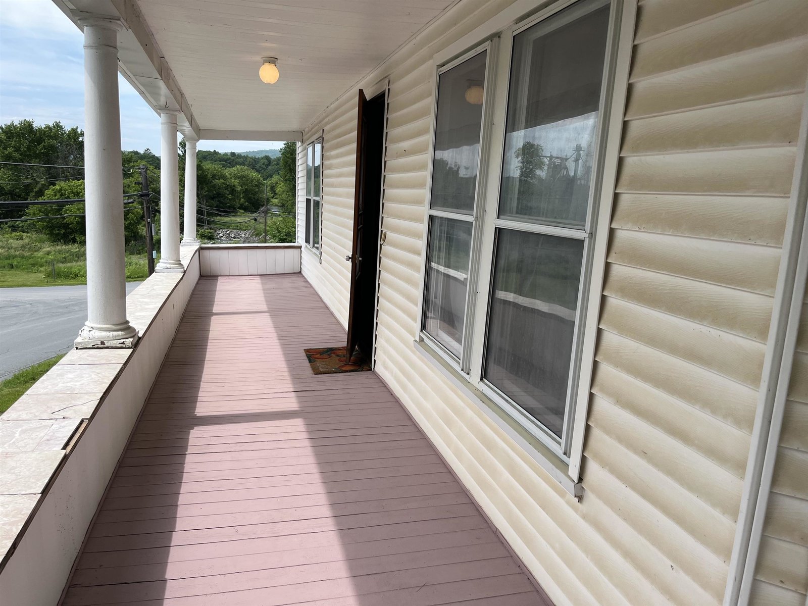 Freshly Repaired and Painted Porch Floor