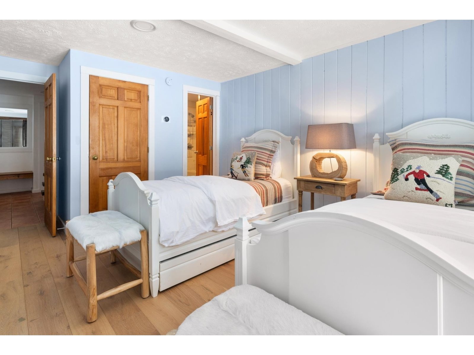 Main level guest bedroom with 3/4 ensuite bathroom
