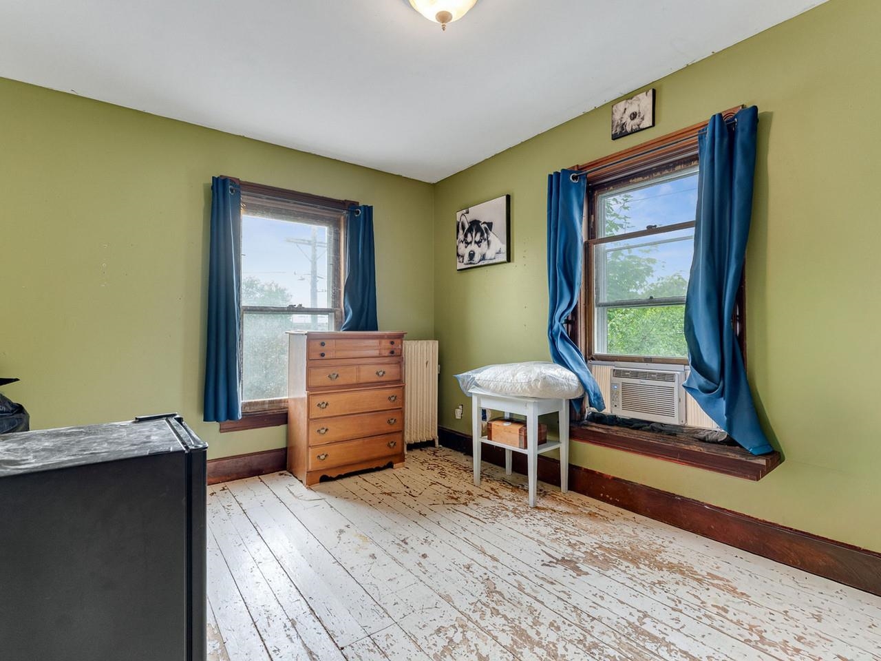Corner bedroom wood floors