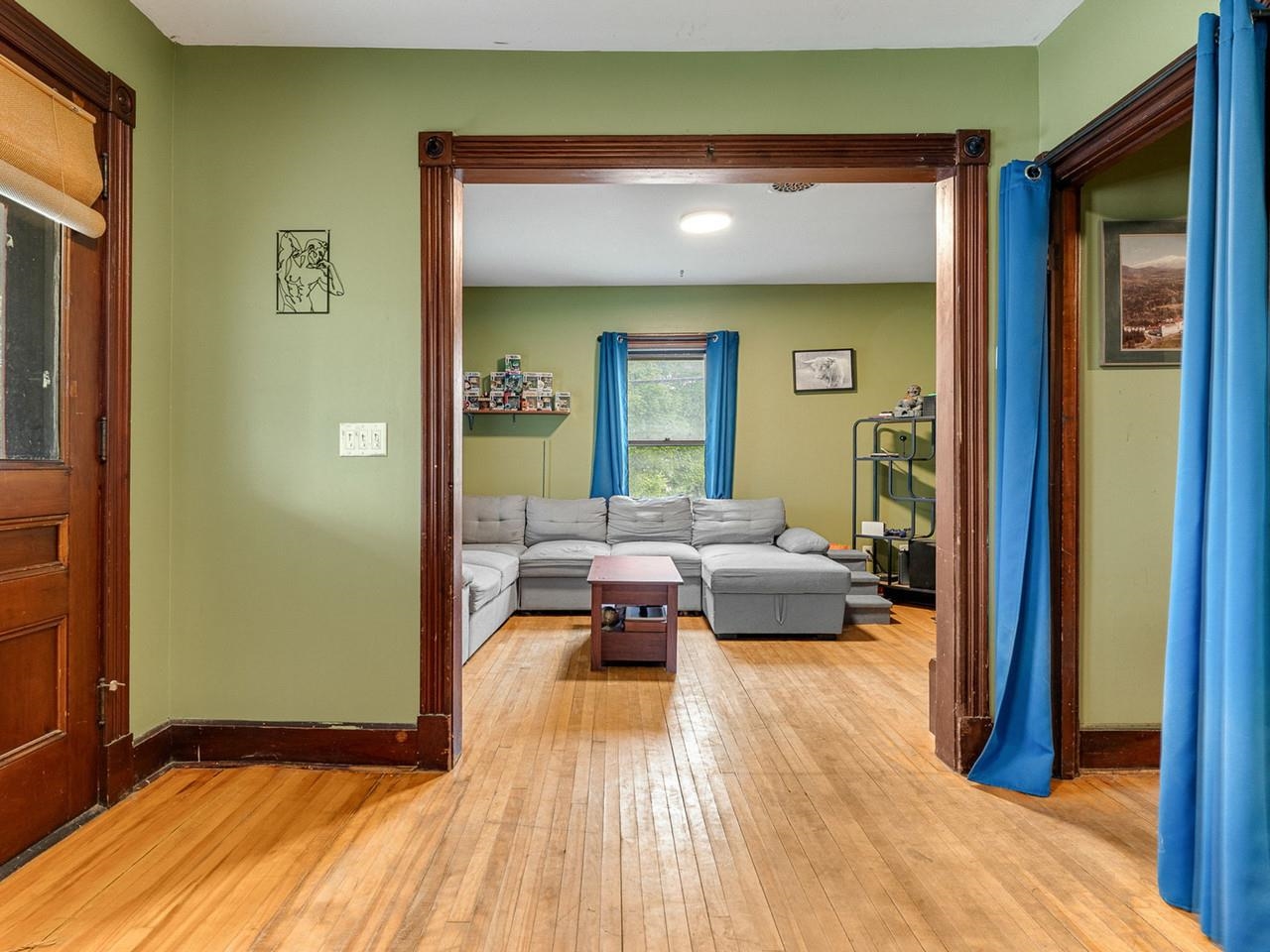 Open layout with wood floors