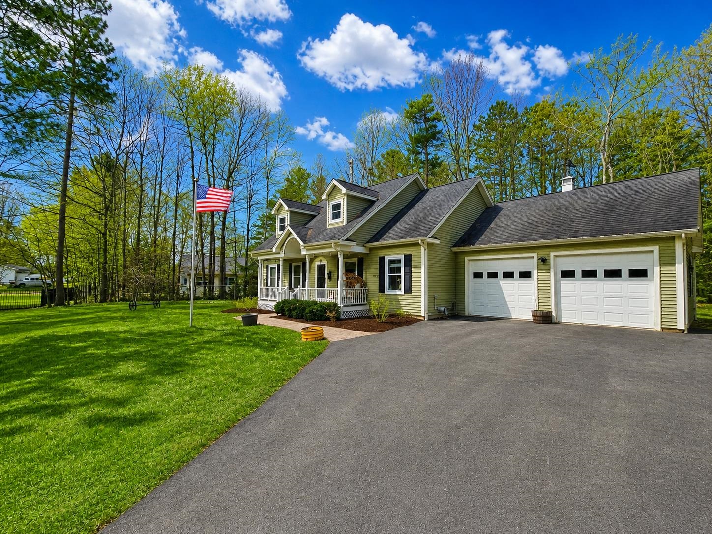 Paved Driveway & 2-Car Garage
