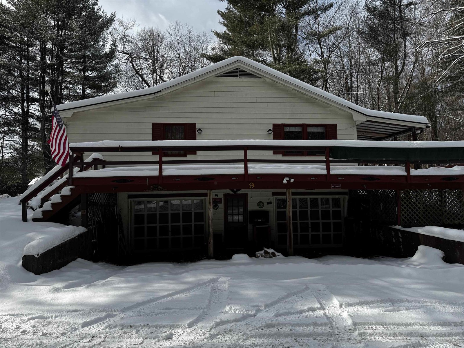 Deck above 2-car Garage Entrance