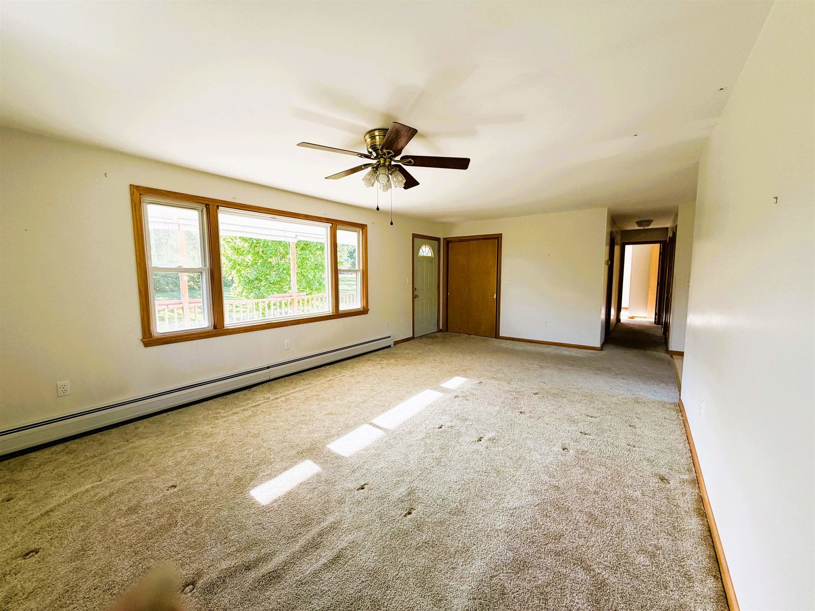 Front Entry on Left & Hallway to Bedrooms