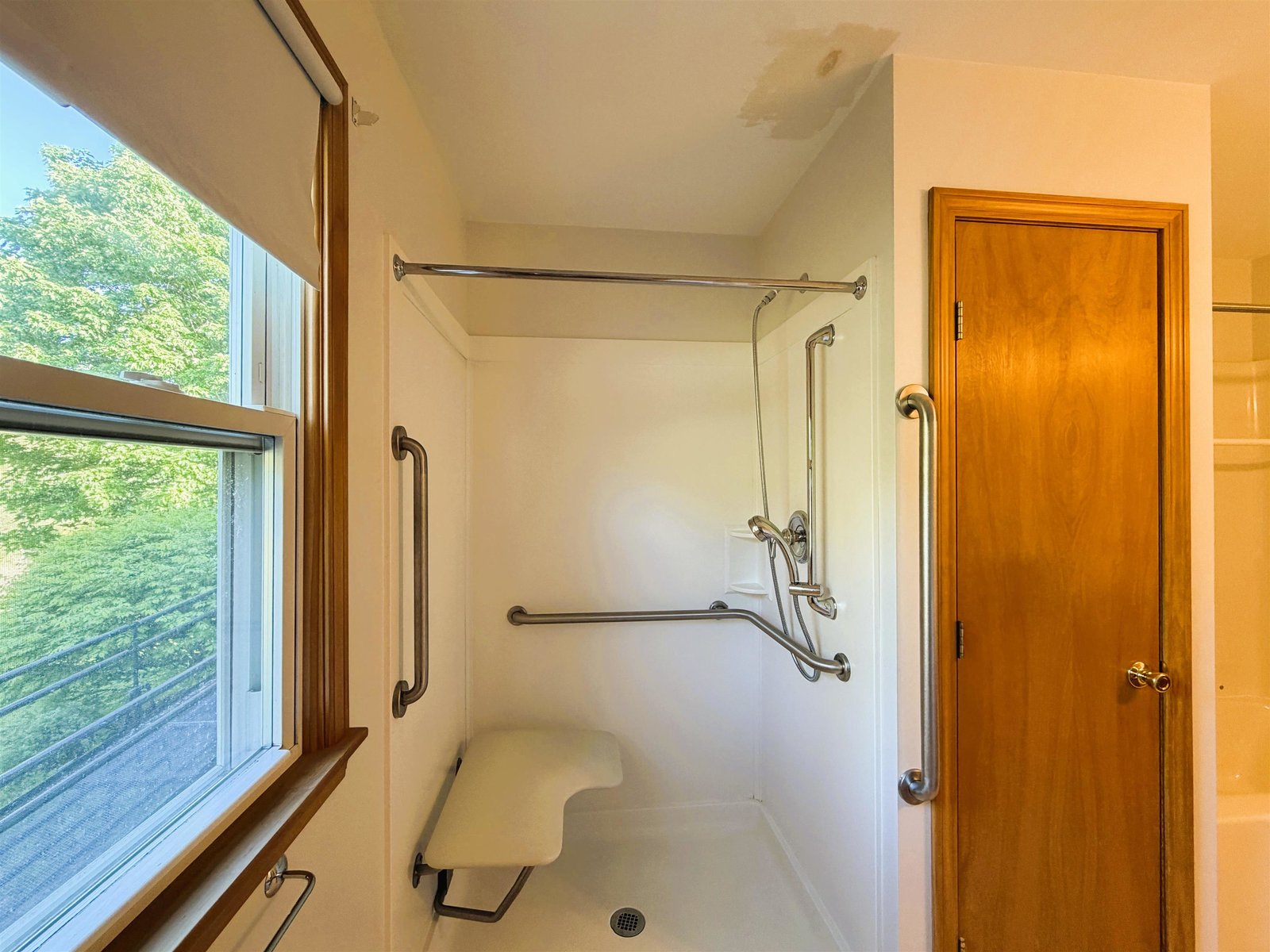 Walk-in Shower with Adjacent Linen Closet