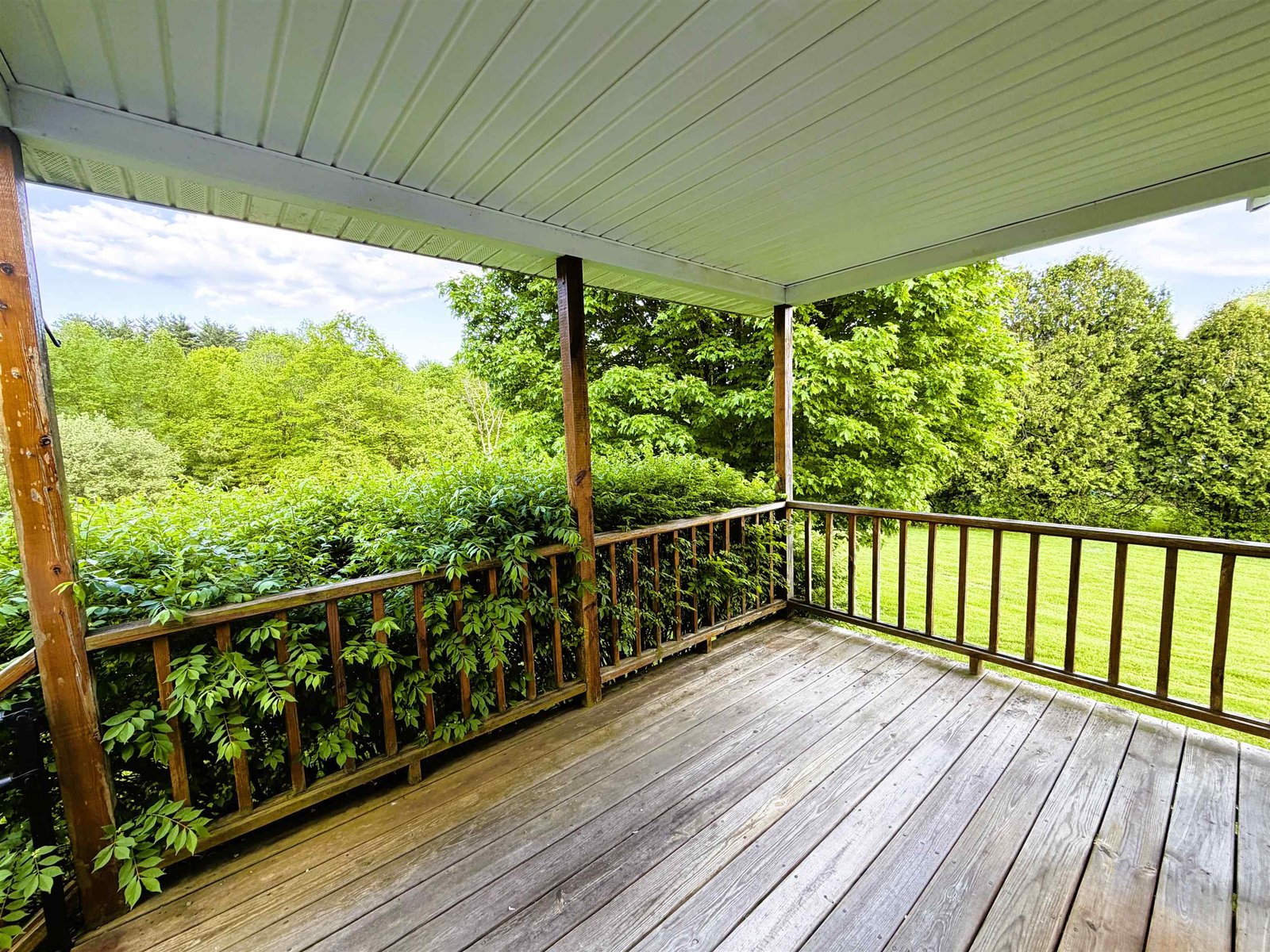 Leads to Back Covered Porch with Door to Kitchen