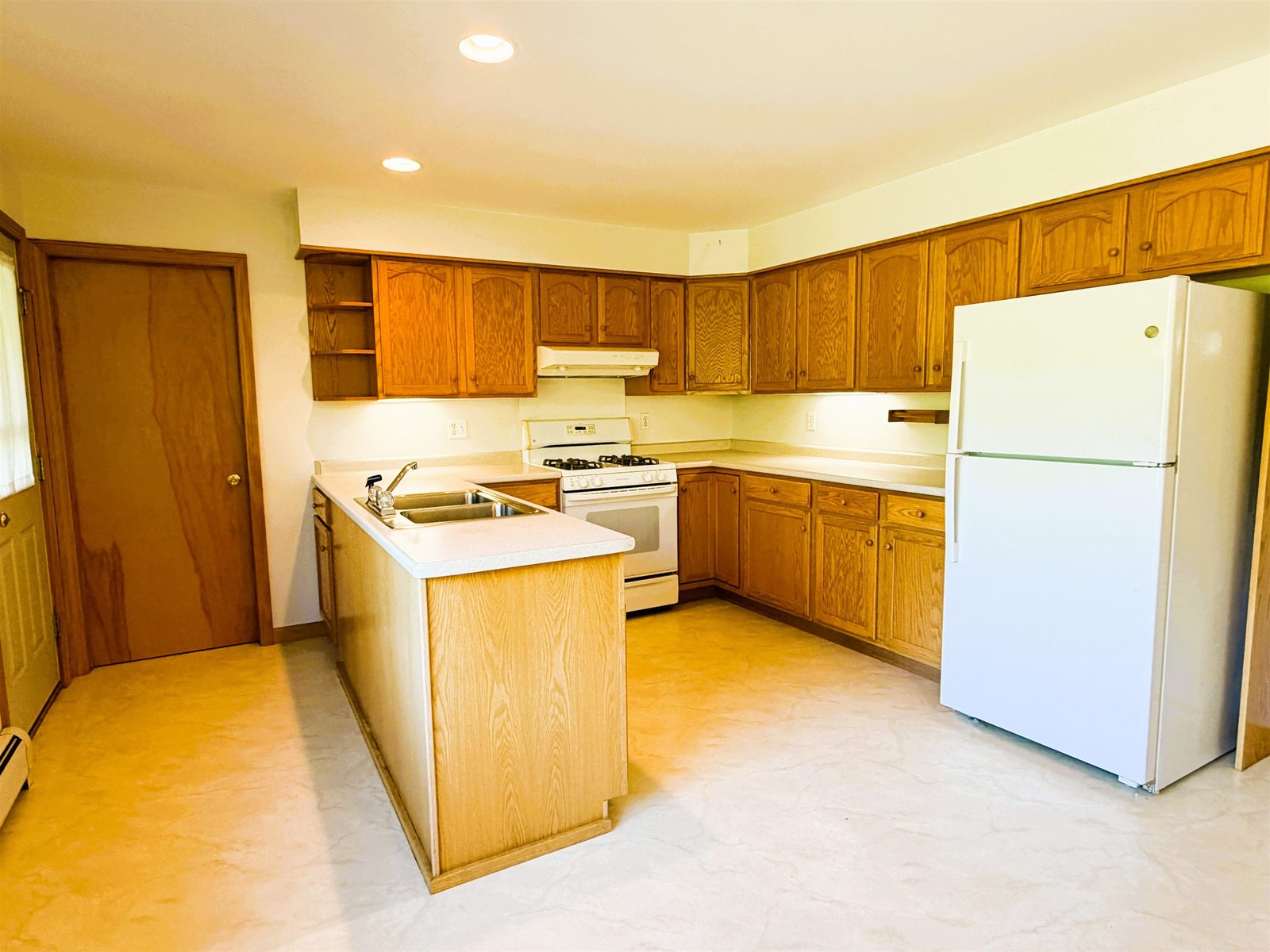 Door to Basement next to Kitchen Counter