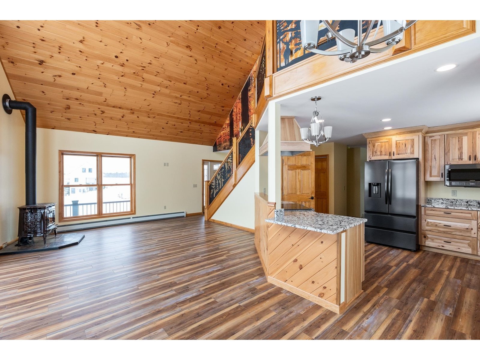 Wide open living space with extensive hardwood flooring