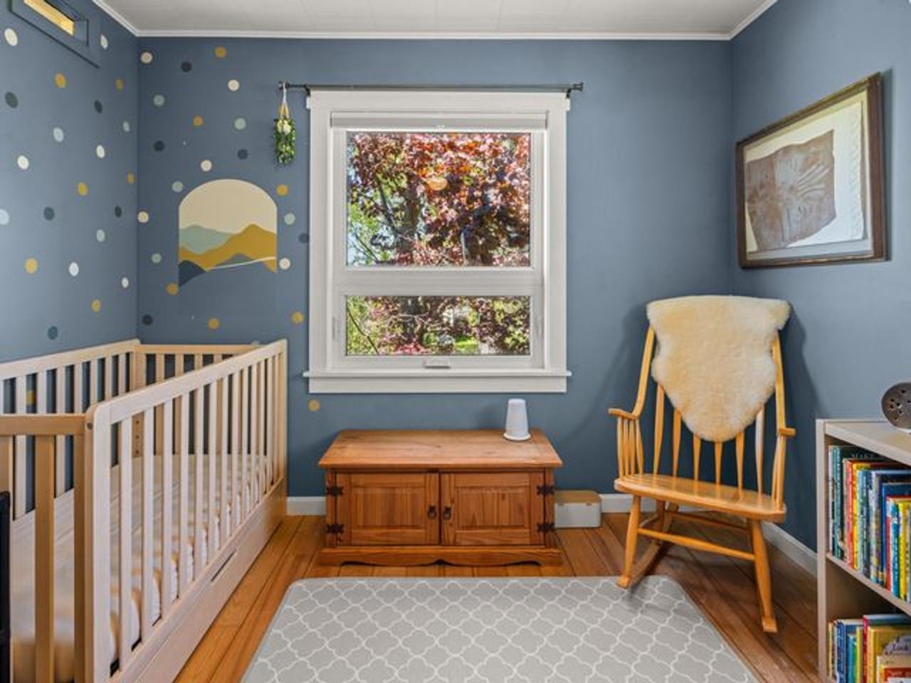 Nursery with Hardwood Floors