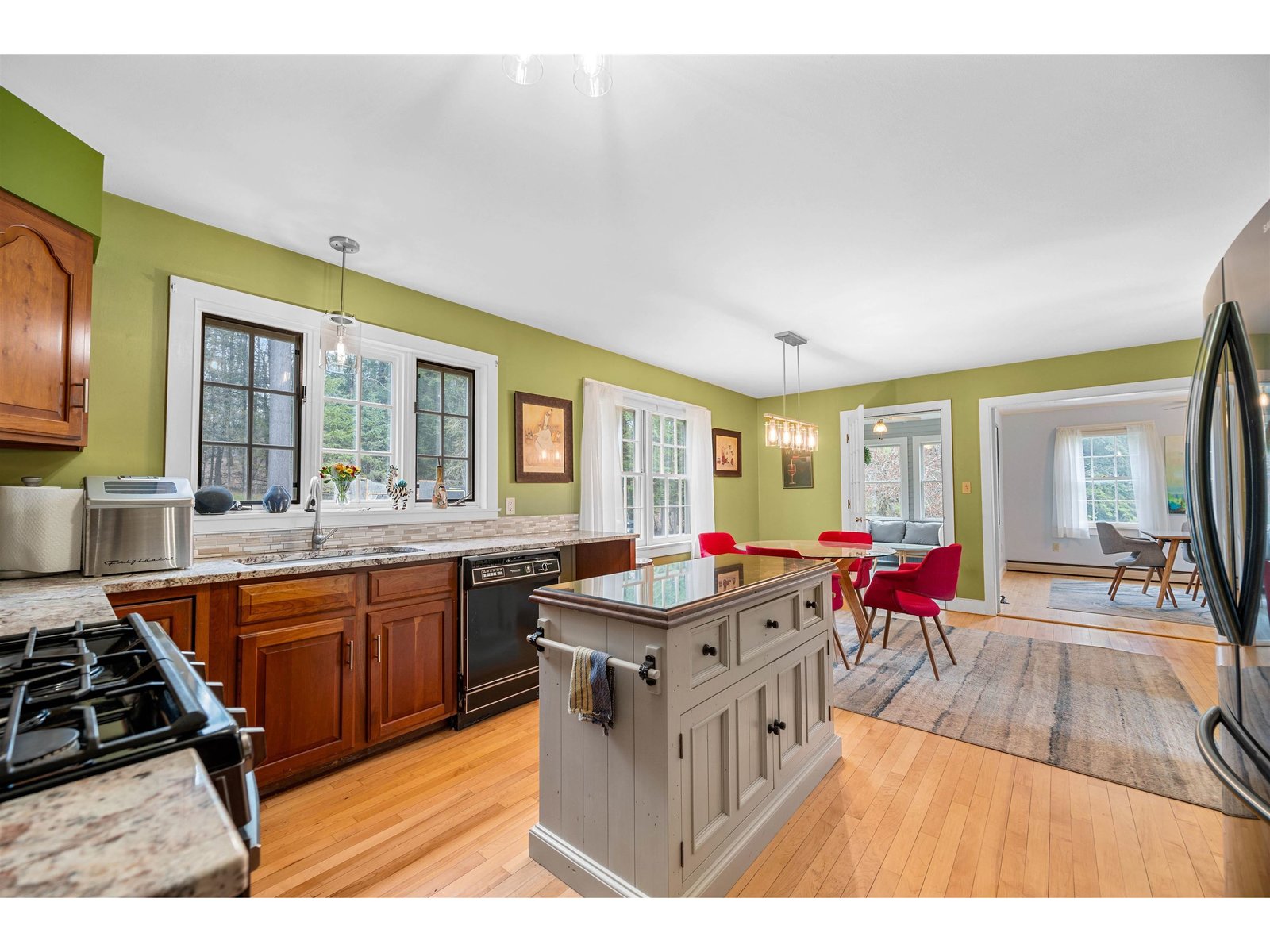 granite counters, island , gas stove