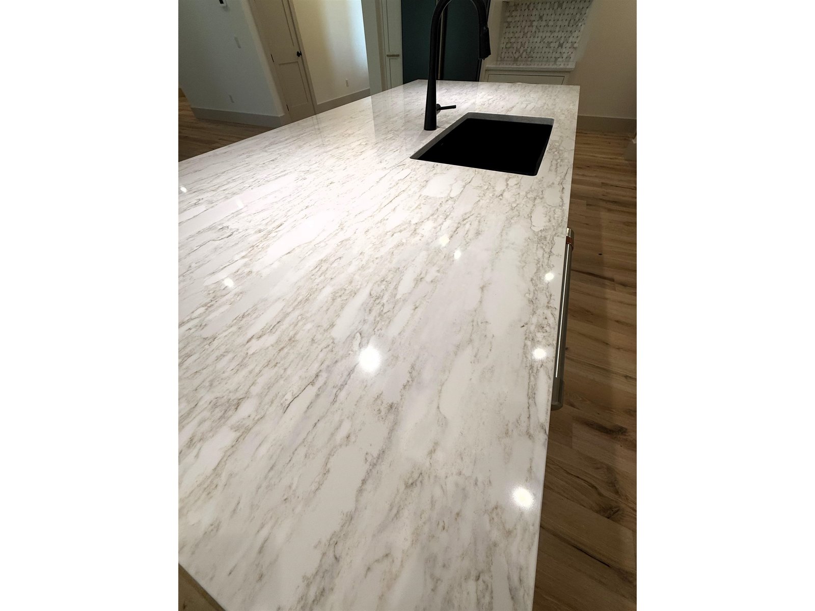 Gleaming Quartz countertops throughout the home