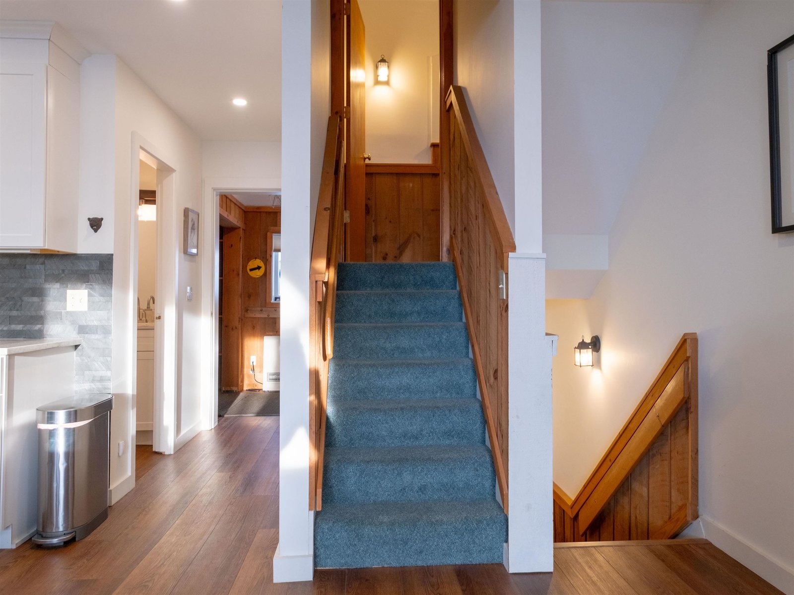 Stairs to private primary en suite